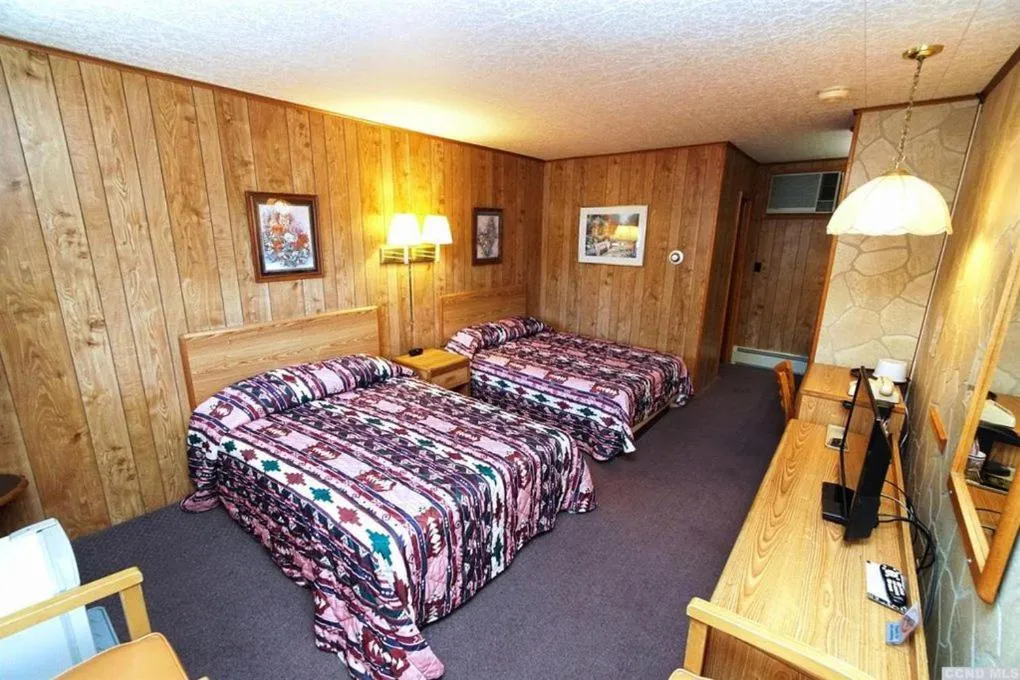 Bed in Red Ranch Inn