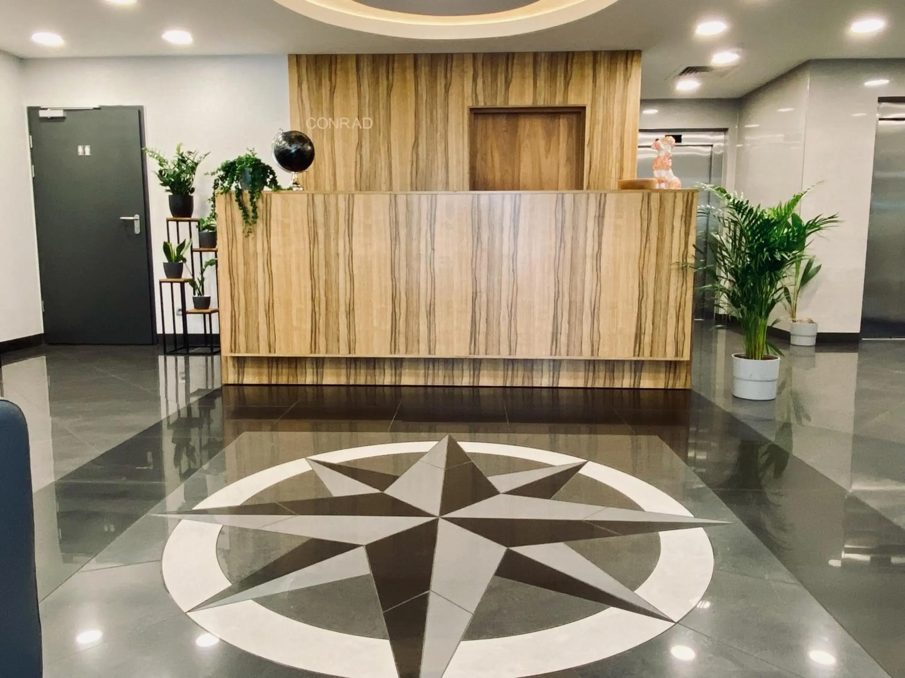Lobby or reception in Hotel CONRAD Comfort Lobby or reception in Hotel CONRAD Comfort