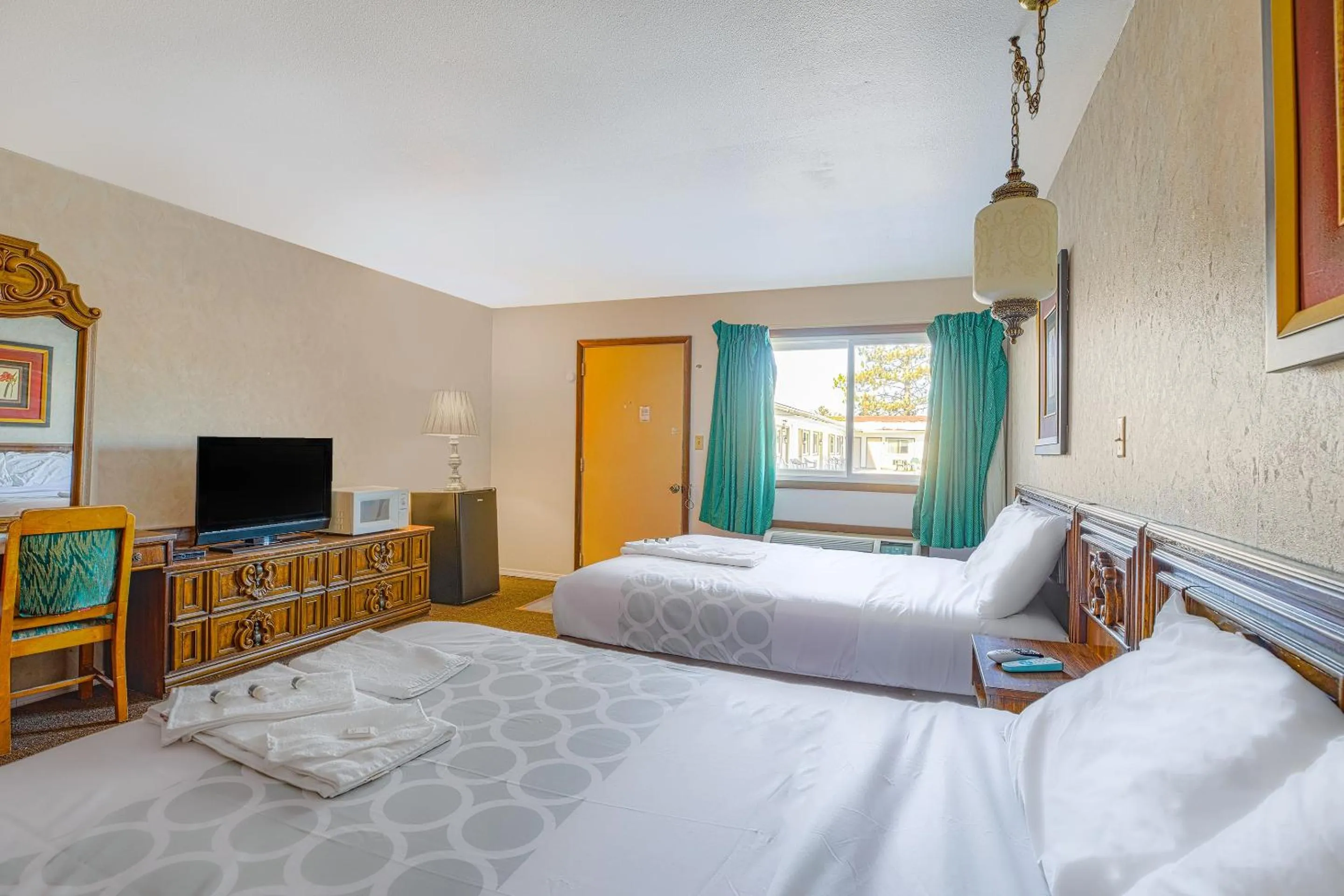 Bedroom, Bed in Love Hotels Tomahawk by OYO at Lake Mohawksin WI