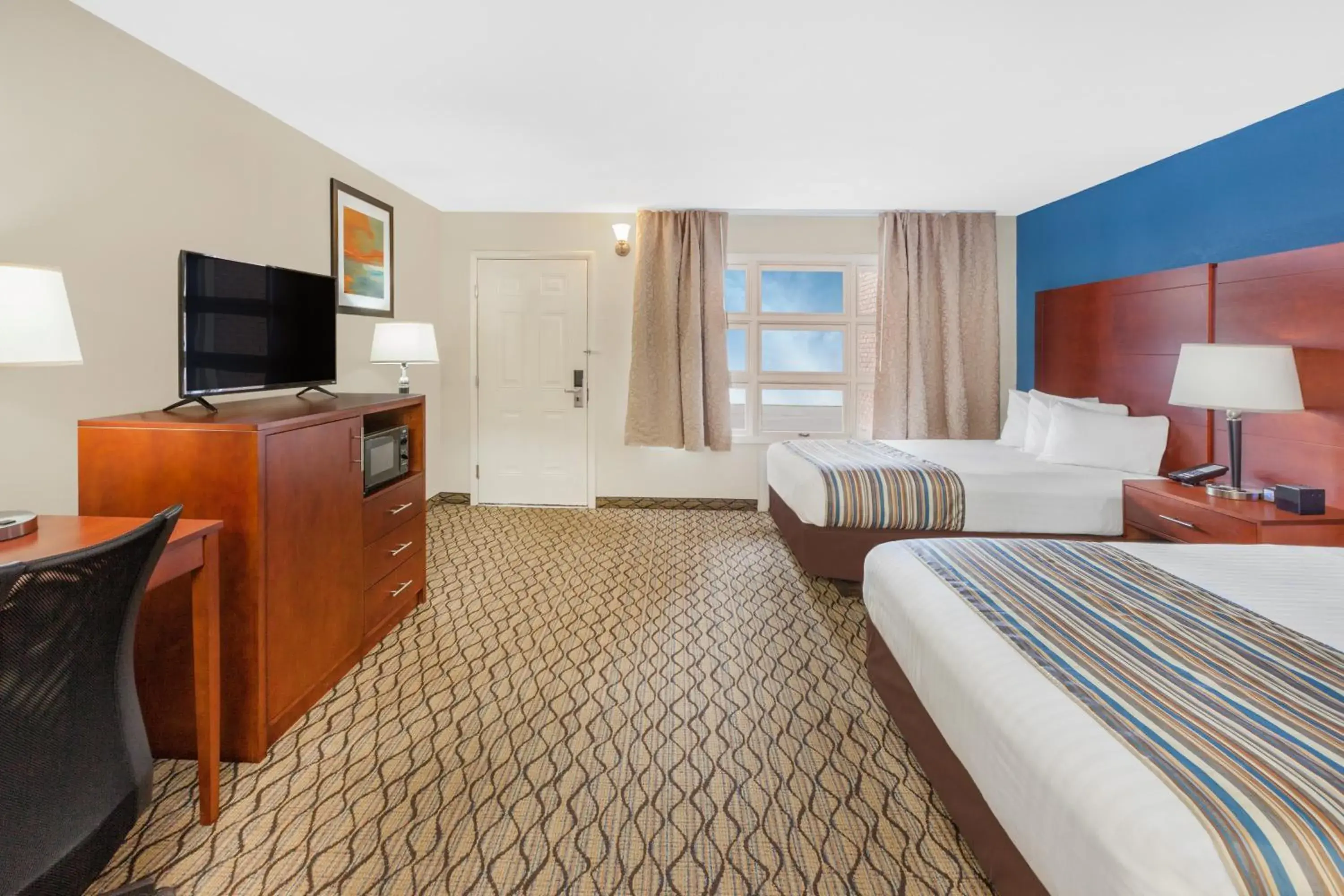 Courtside Queen Room with Two Queen Beds - Pet Friendly in Baymont by Wyndham St. Ignace Lakefront Courtside Queen Room with Two Queen Beds - Pet Friendly in Baymont by Wyndham St. Ignace Lakefront