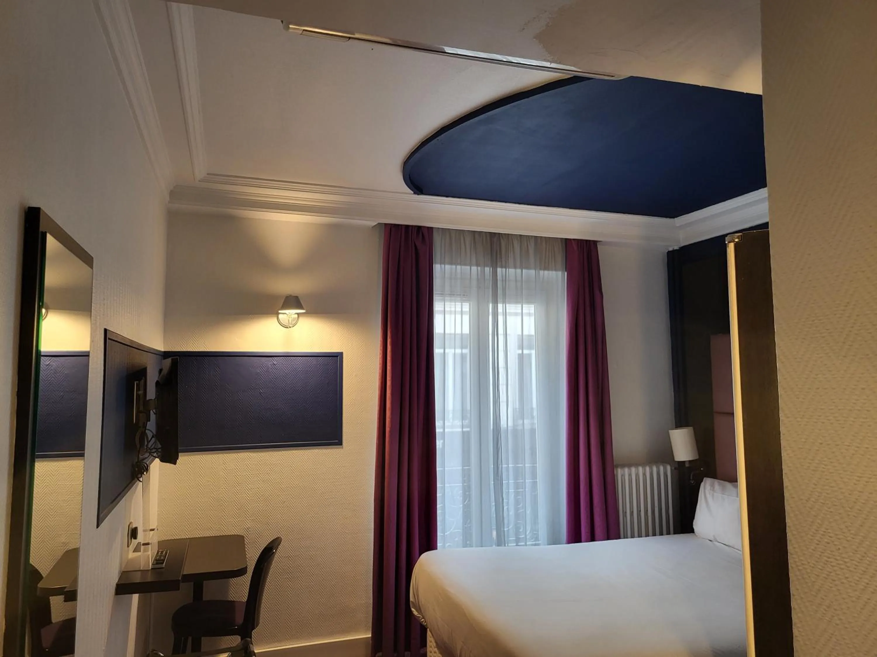 Photo of the whole room, Bed in Accueil Hôtel Paris Pigalle Montmartre