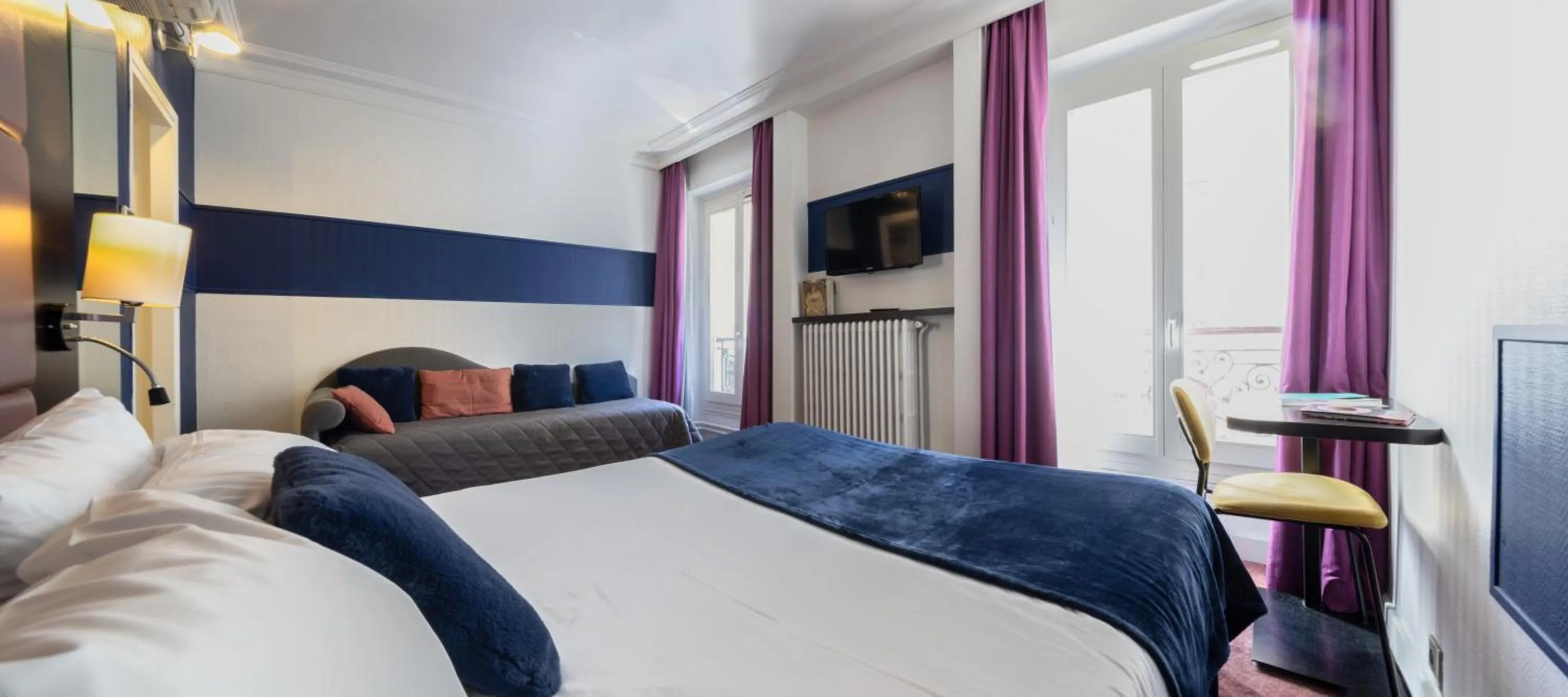 Photo of the whole room, Bed in Accueil Hôtel Paris Pigalle Montmartre