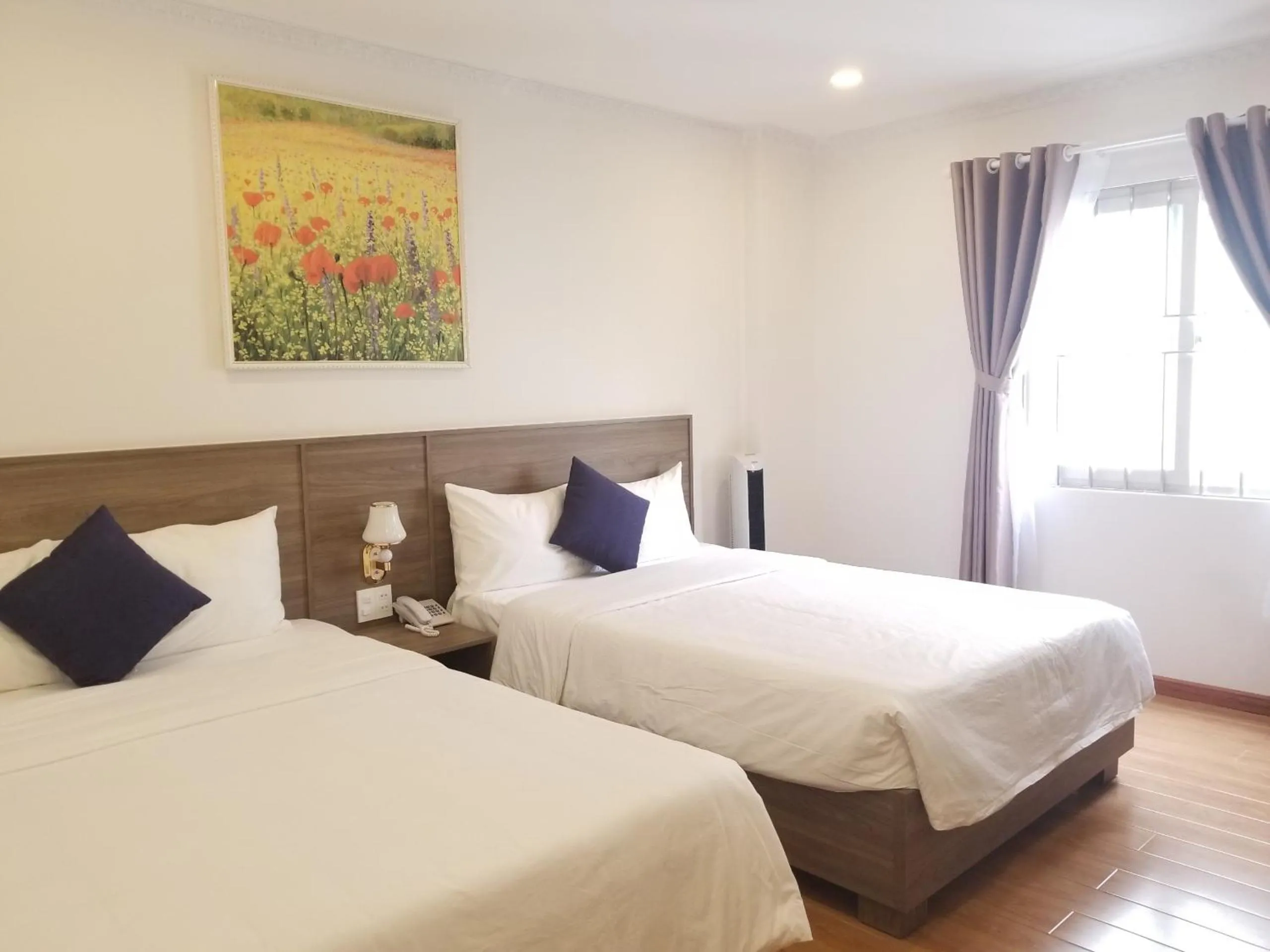 Bed in DẠ LAN HOTEL