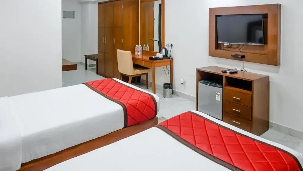 TV and multimedia, Bed in The Altruist Hotel Navi Mumbai-1 TV and multimedia, Bed in The Altruist Hotel Navi Mumbai-1