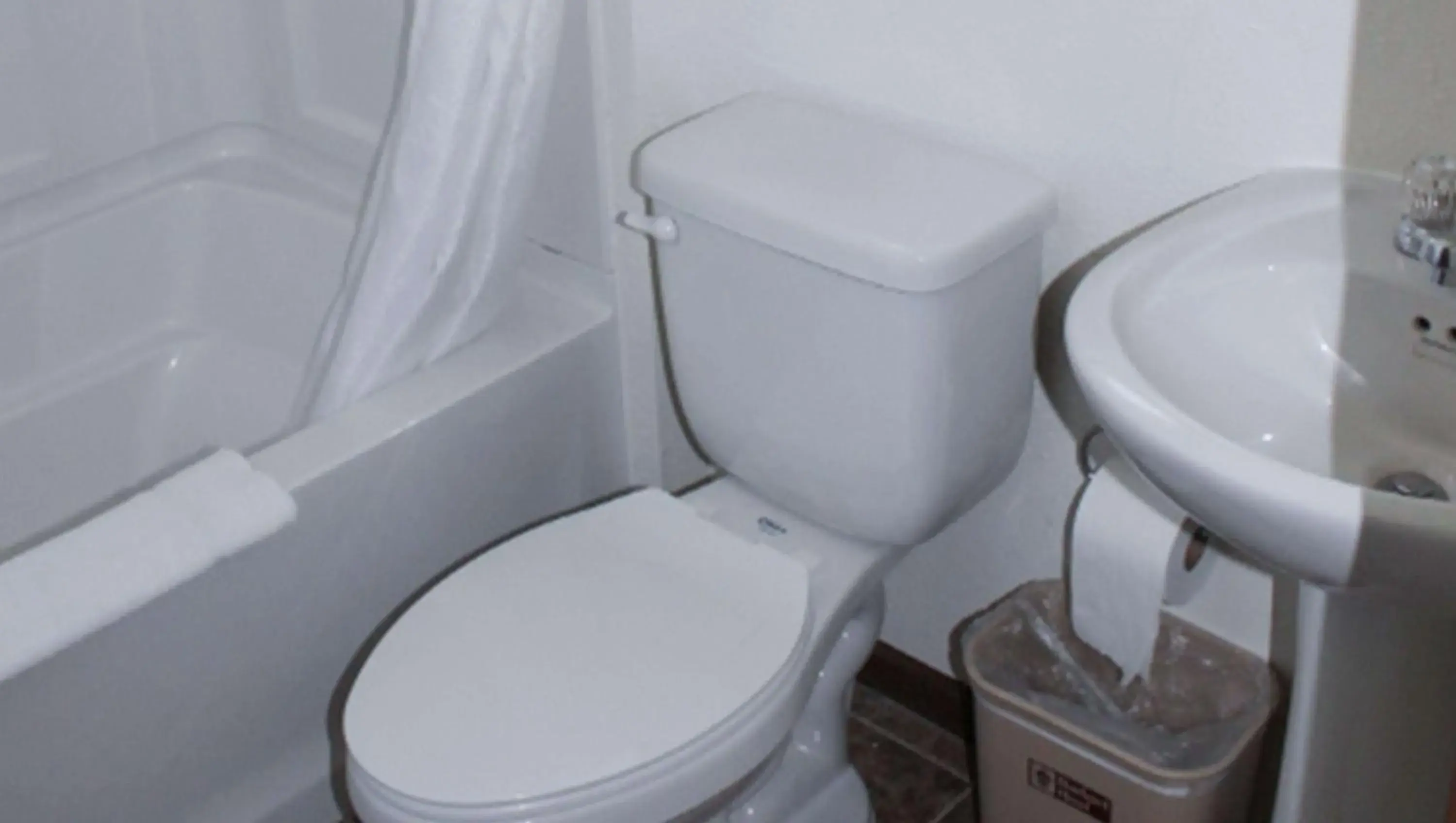 Bathroom in Golden Wheat Budget Host Inn Junction City Bathroom in Golden Wheat Budget Host Inn Junction City