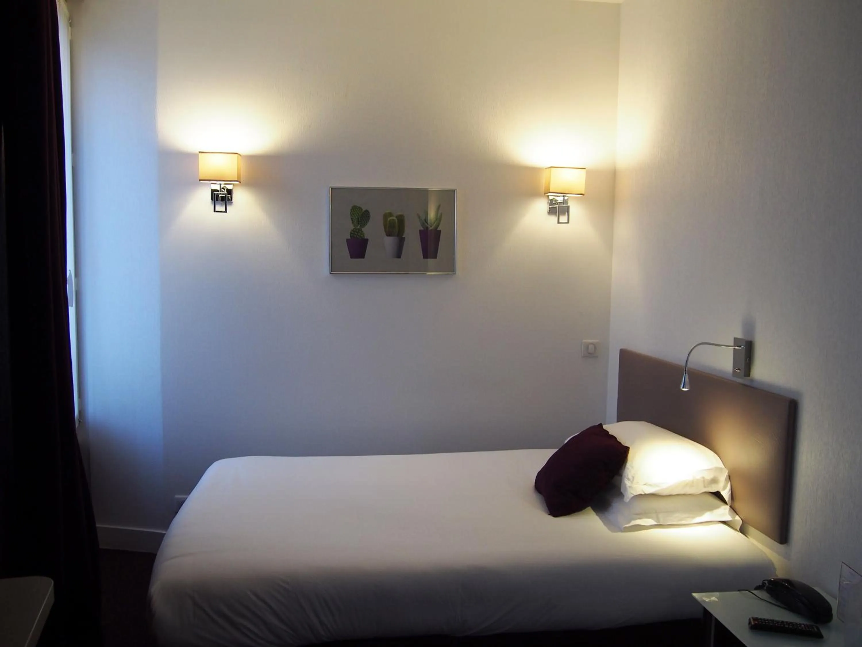 Bed in Porte de Versailles Hotel