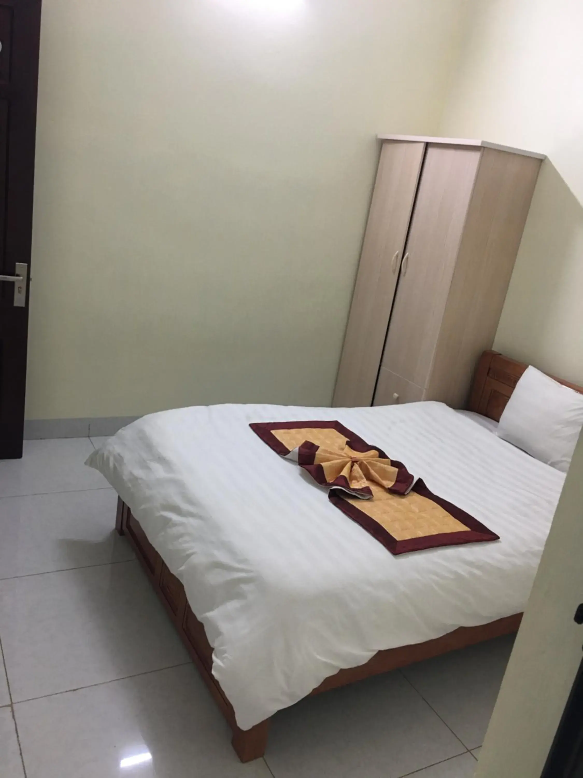 Bed in Duc Thang Guest House (Nhà Nghỉ Đức Thắng) Bed in Duc Thang Guest House (Nhà Nghỉ Đức Thắng)