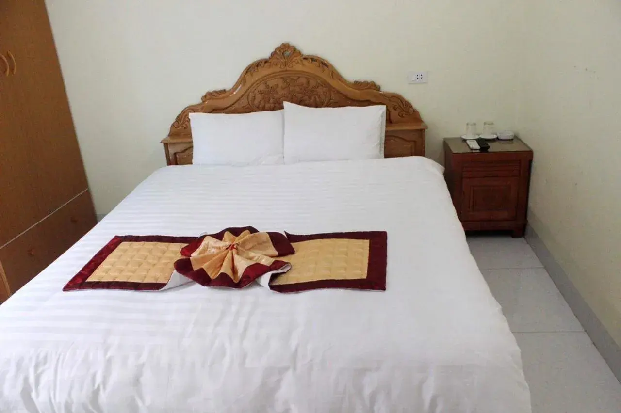 Bed in Duc Thang Guest House (Nhà Nghỉ Đức Thắng) Bed in Duc Thang Guest House (Nhà Nghỉ Đức Thắng)