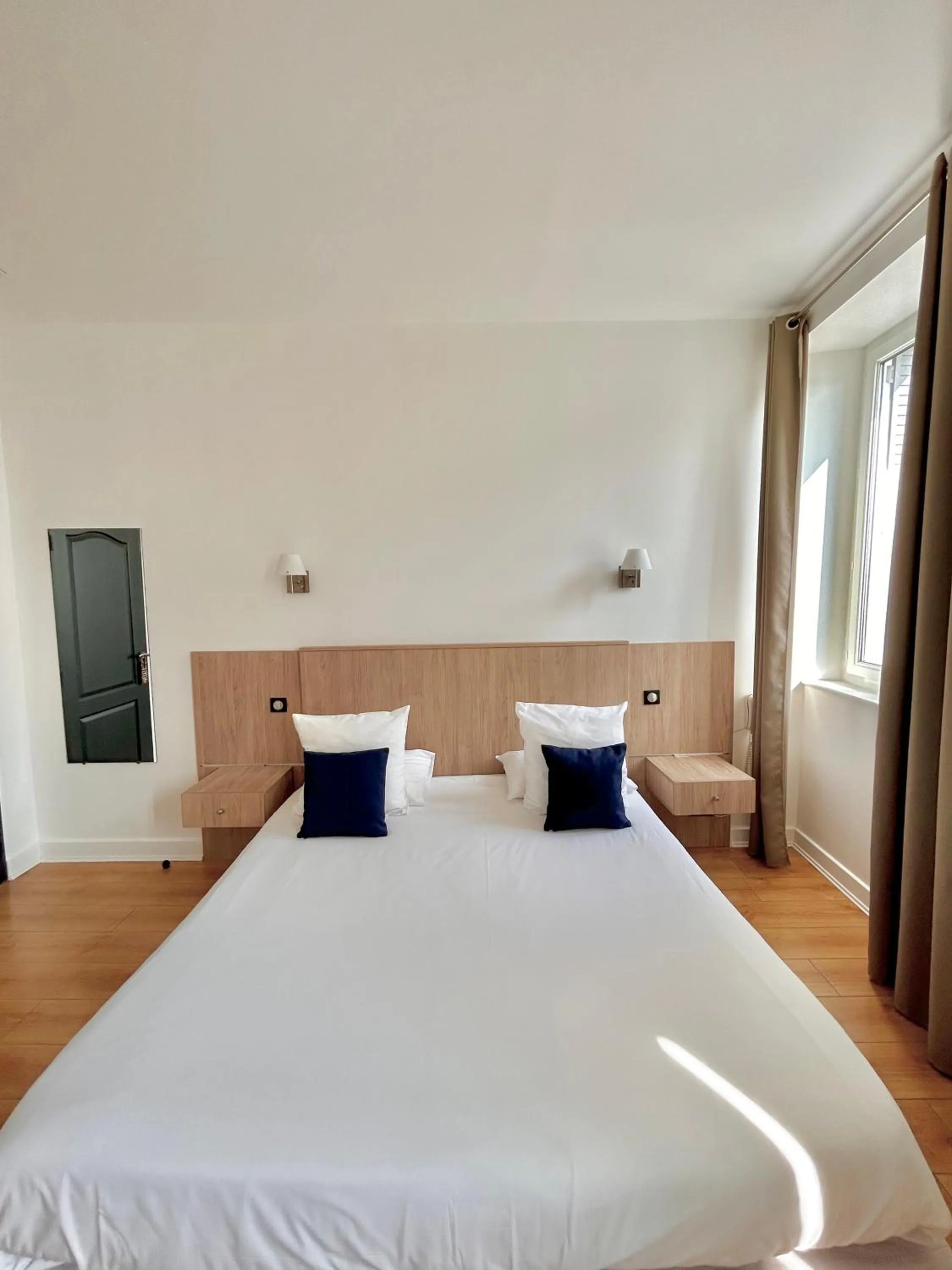 Photo of the whole room, Bed in Hôtel Les Deux Coteaux