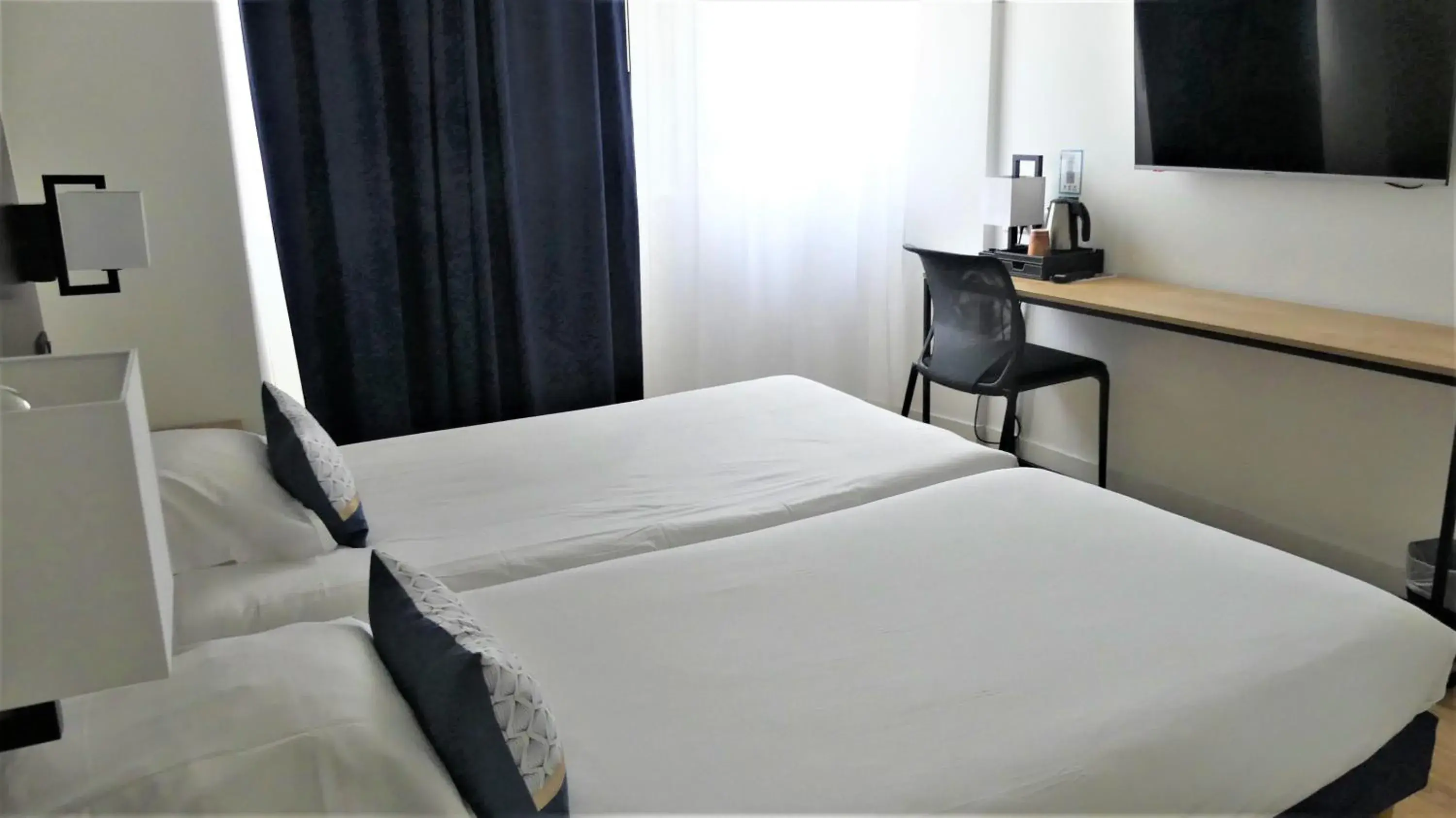 Twin Room in Hotel Abbaye du Golf de Lésigny Twin Room in Hotel Abbaye du Golf de Lésigny