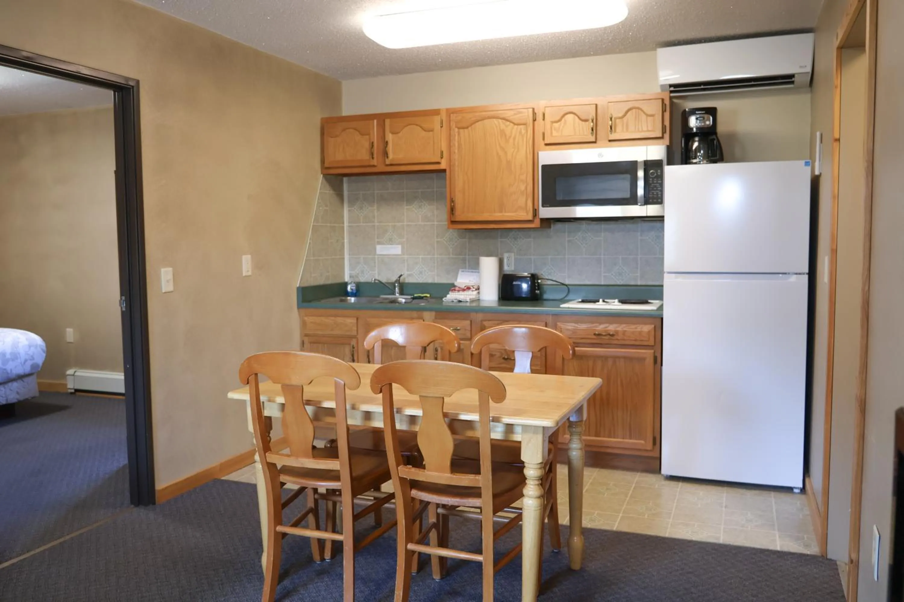Kitchen or kitchenette in Adventure Inn