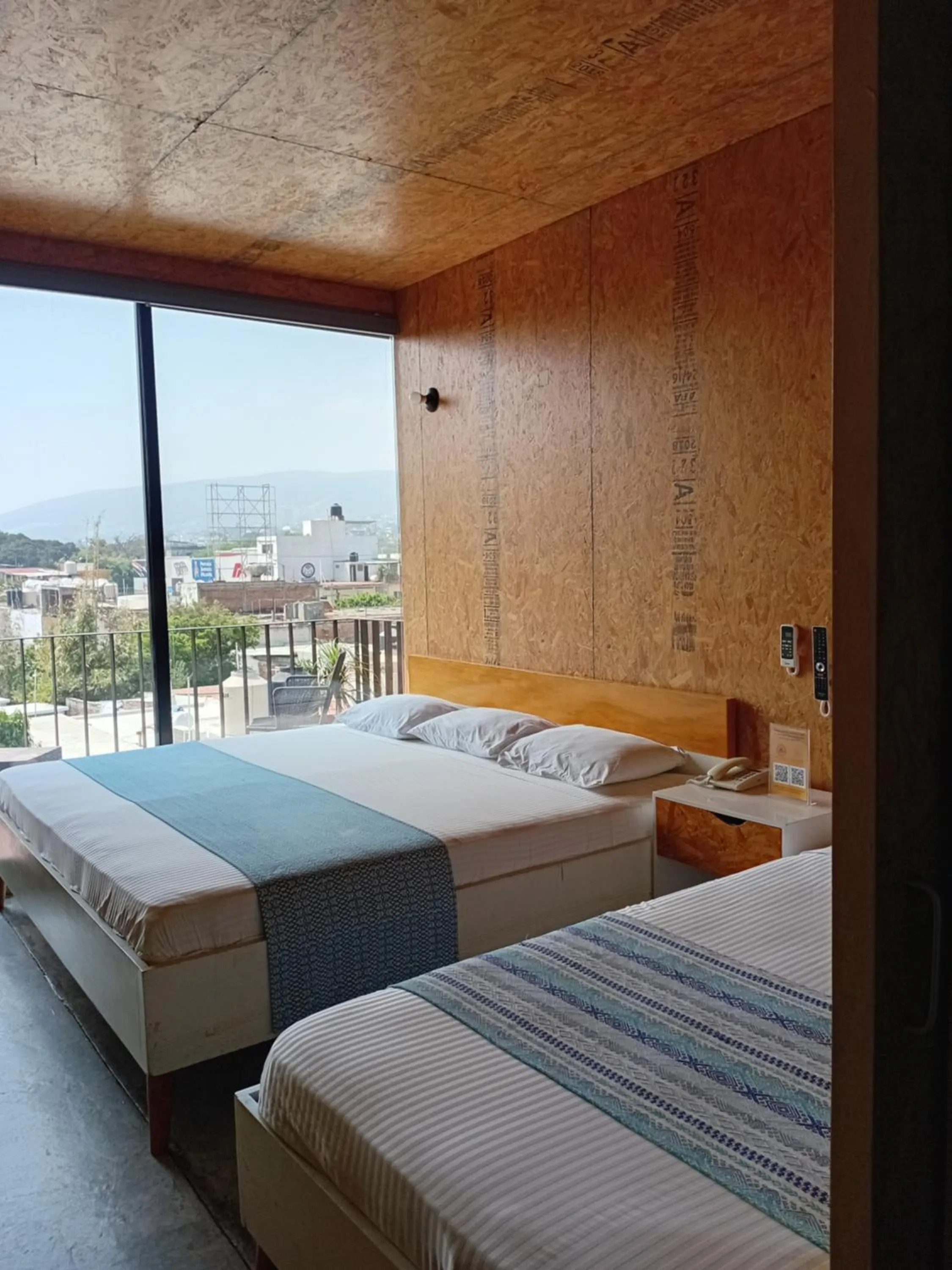 View (from property/room), Bed in Hotel Momotus Tuxtla - Desayuno opcional