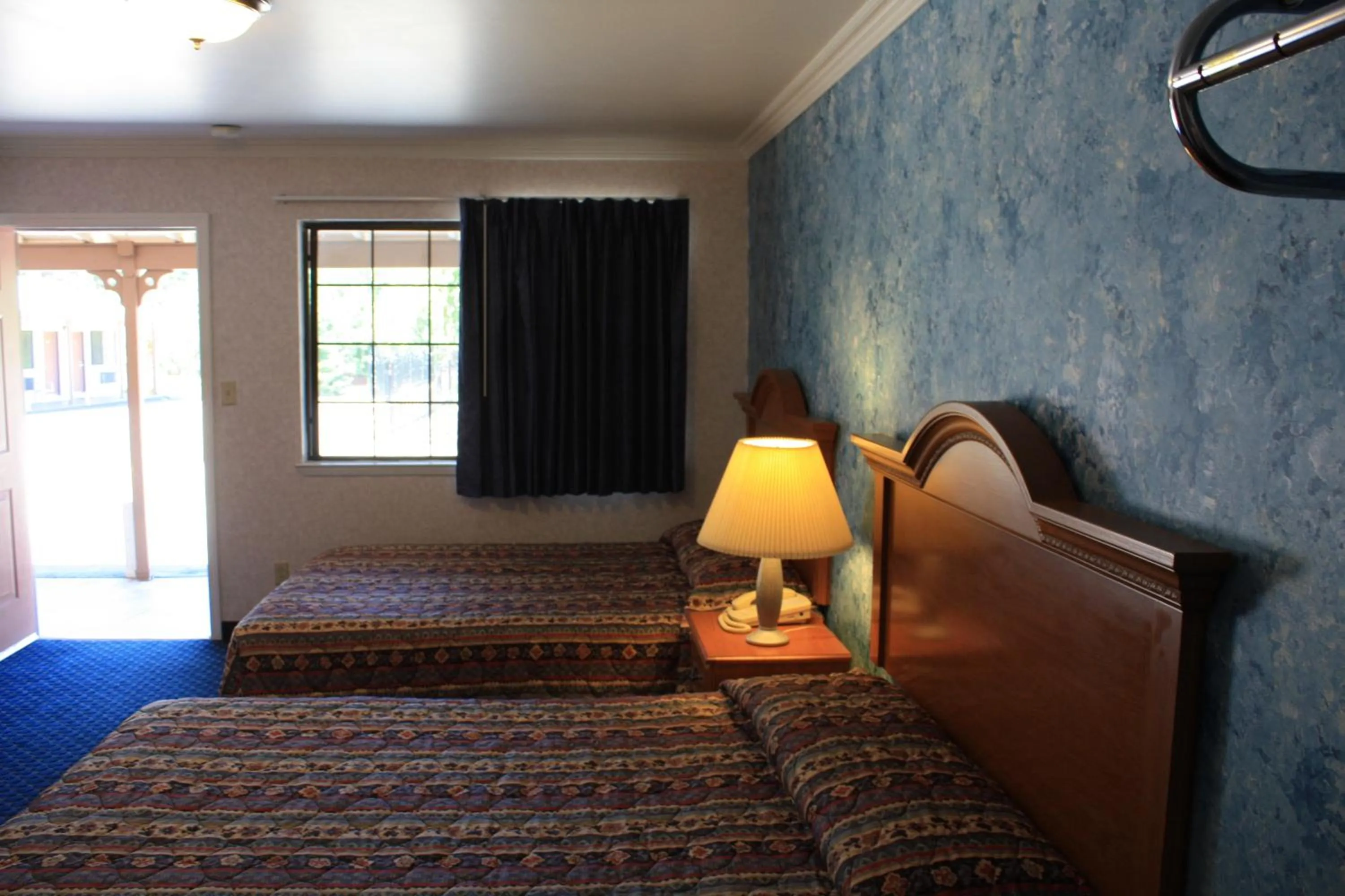 Day, Bed in Mother Lode Motel