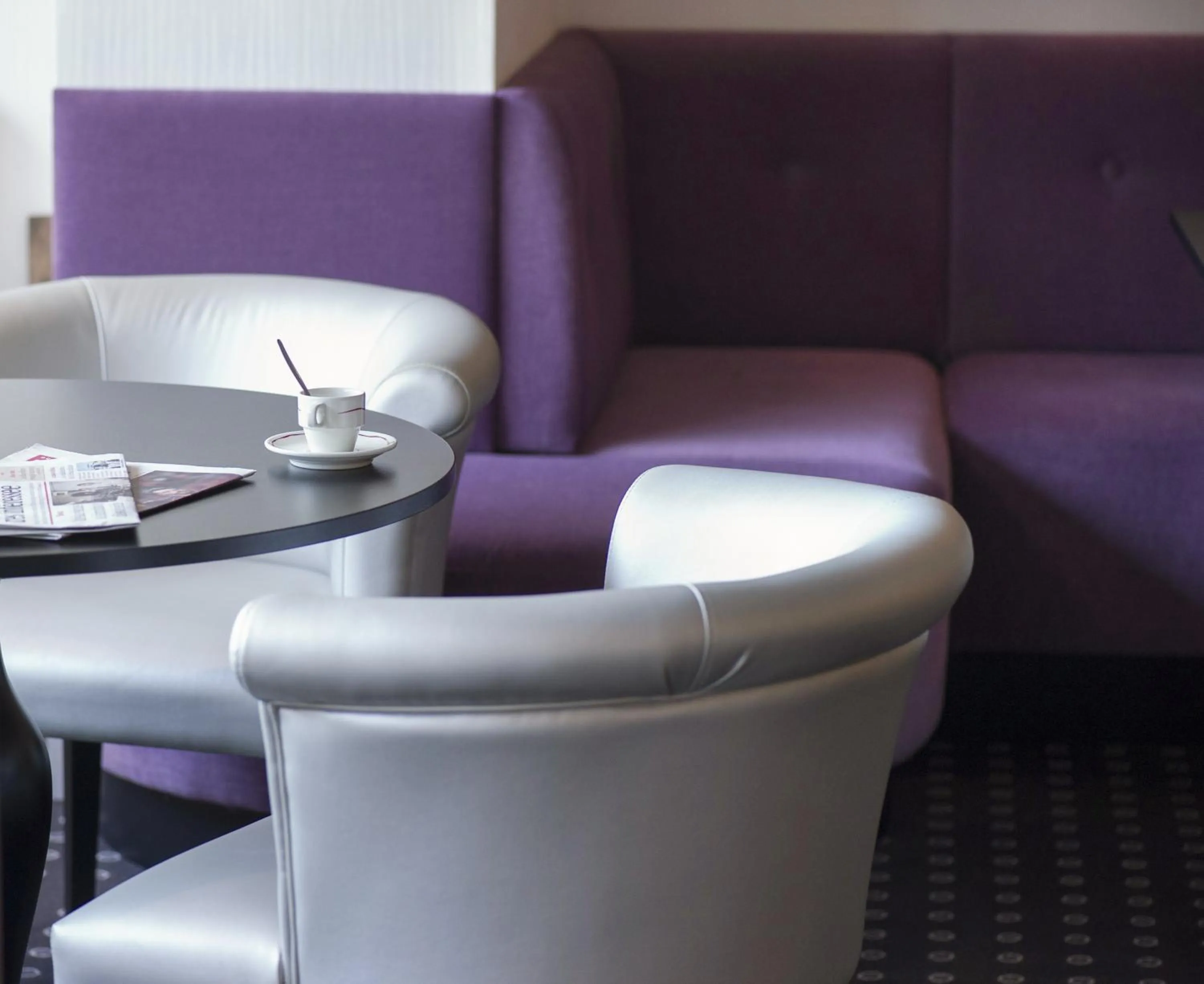 Communal lounge/ TV room in Hôtel Esplanade Eden