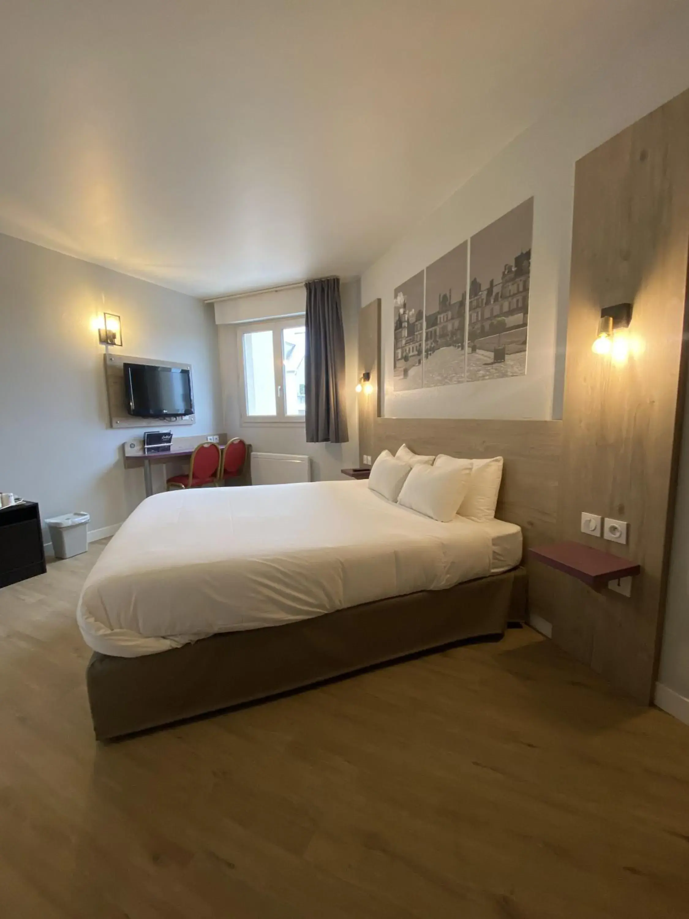 Property building, Bed in Kyriad Saint Fargeau Ponthierry - Apollonia Property building, Bed in Kyriad Saint Fargeau Ponthierry - Apollonia