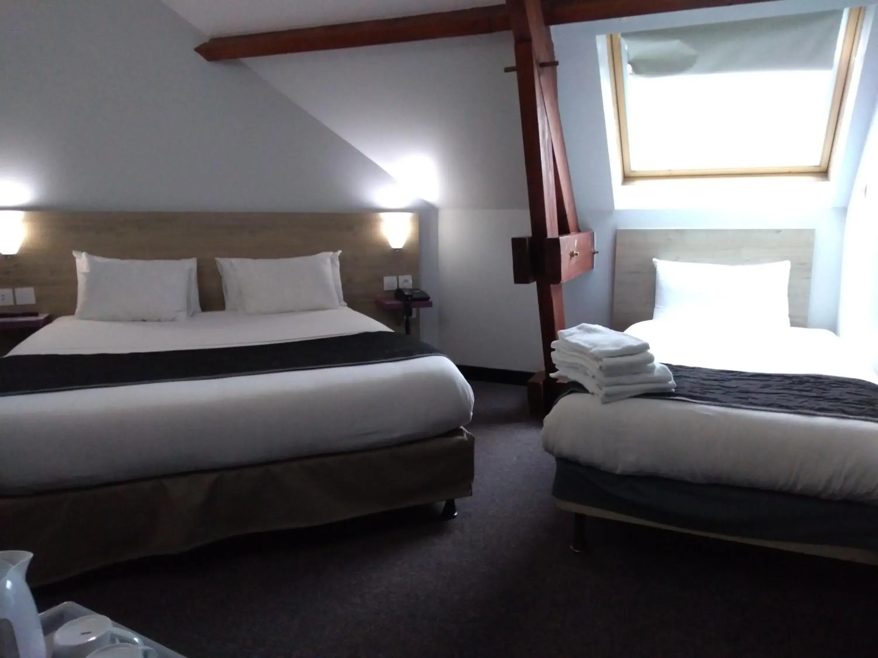 Bed in Kyriad Saint Fargeau Ponthierry - Apollonia Bed in Kyriad Saint Fargeau Ponthierry - Apollonia