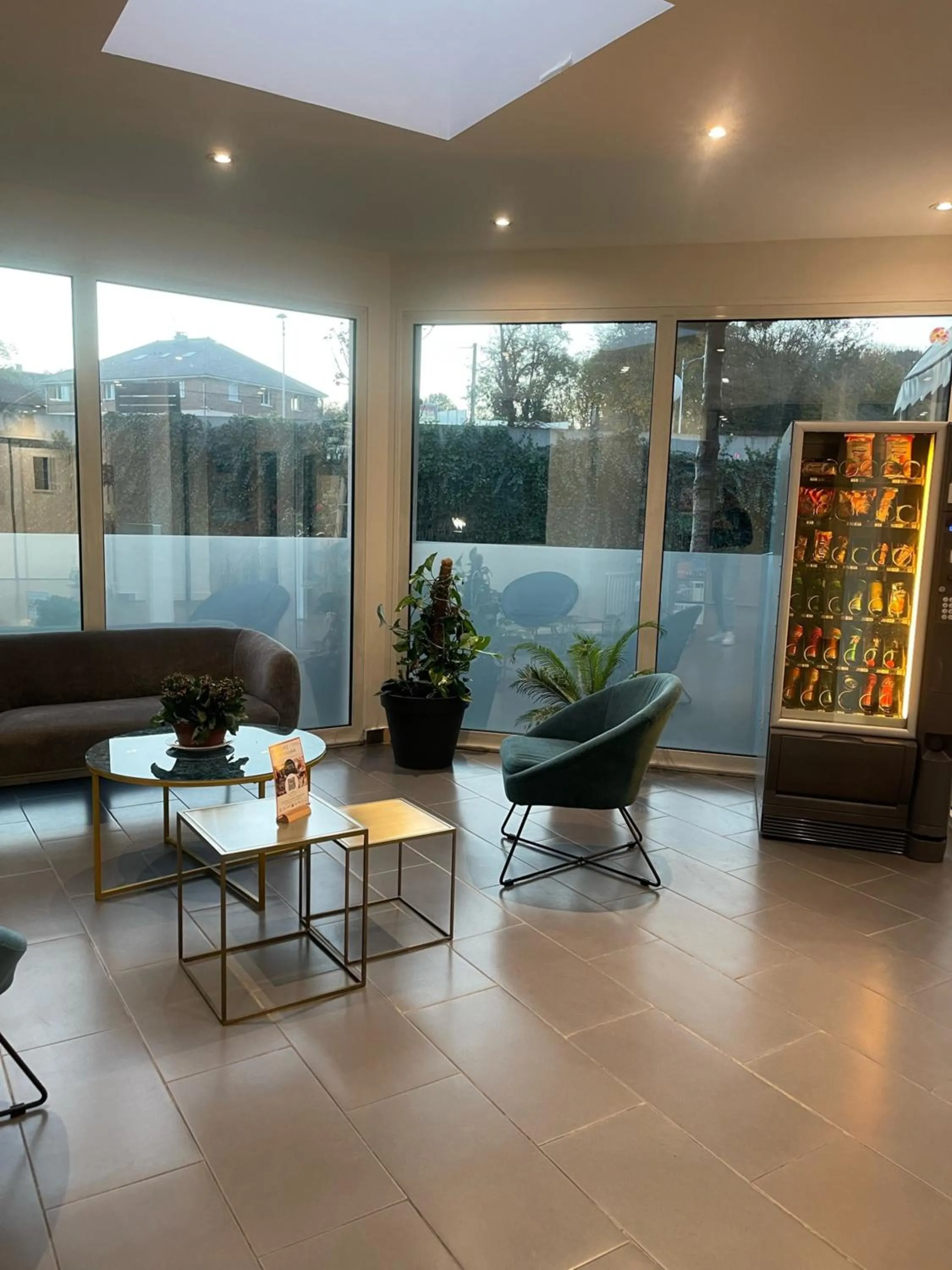 Living room in Kyriad Saint Fargeau Ponthierry - Apollonia
