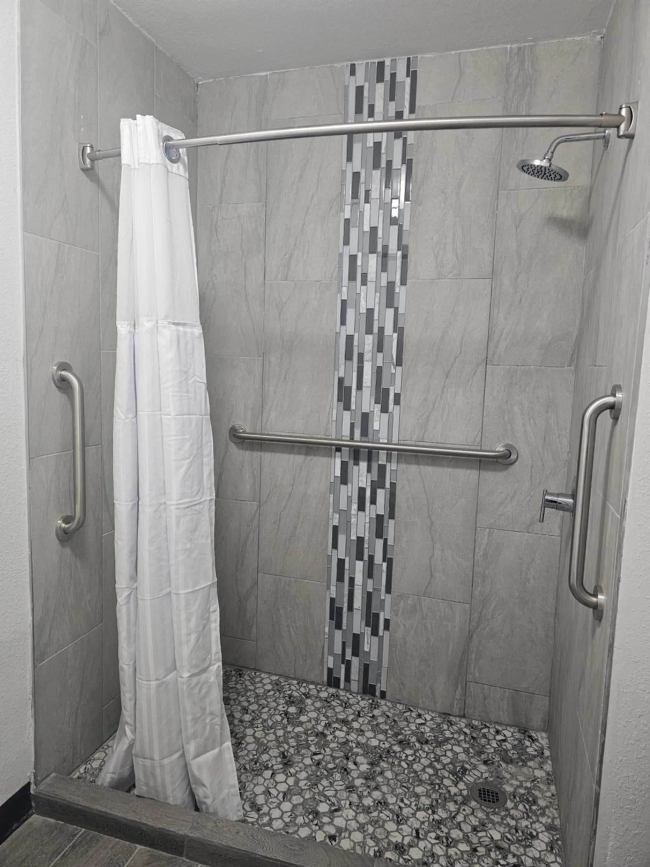 Shower in Super 8 by Wyndham Hobbs