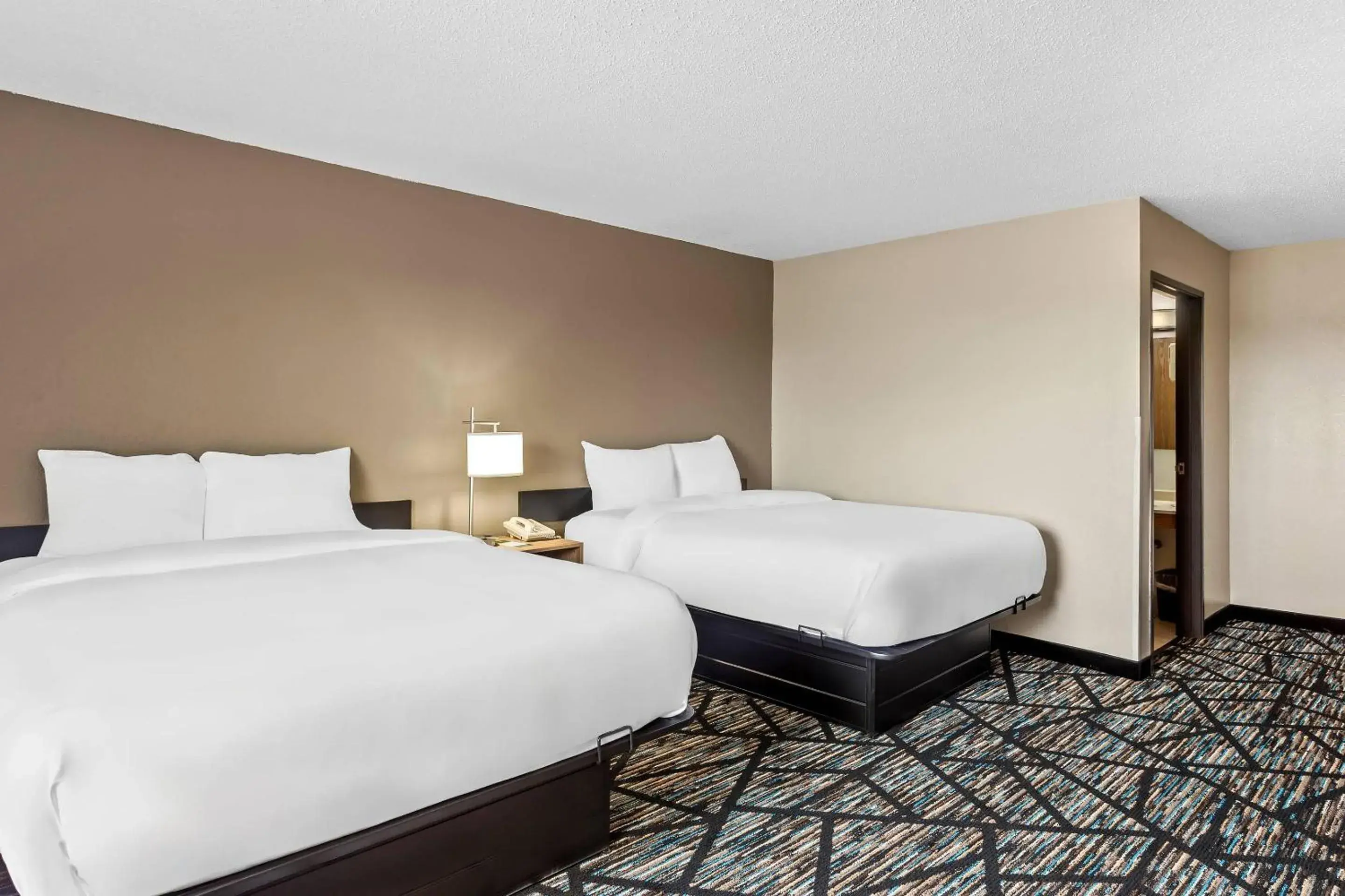 Bedroom, Bed in Quality Inn & Suites Howe - Sturgis Bedroom, Bed in Quality Inn & Suites Howe - Sturgis