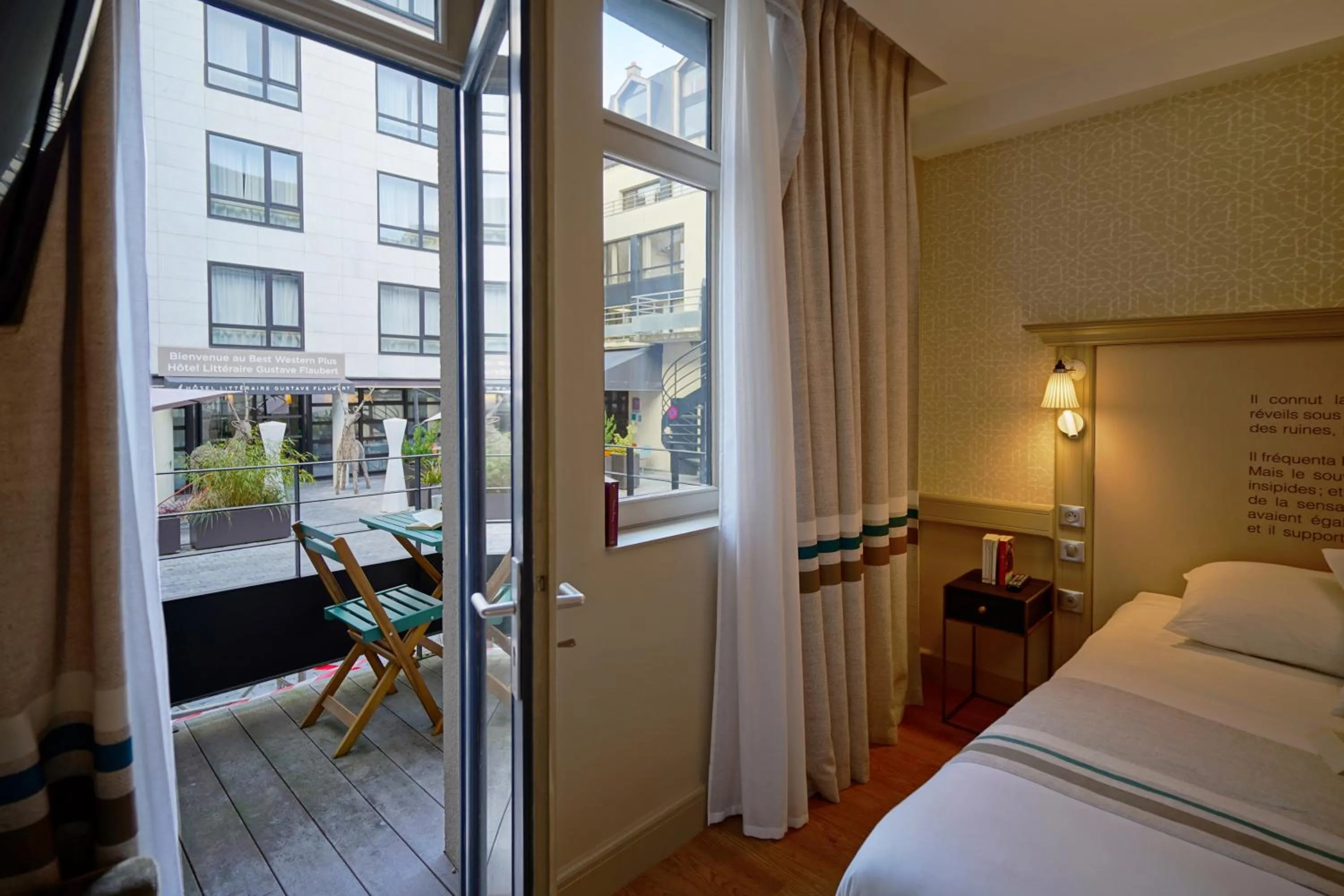 Balcony/Terrace, Bed in Hôtel Littéraire Gustave Flaubert, BW Signature Collection