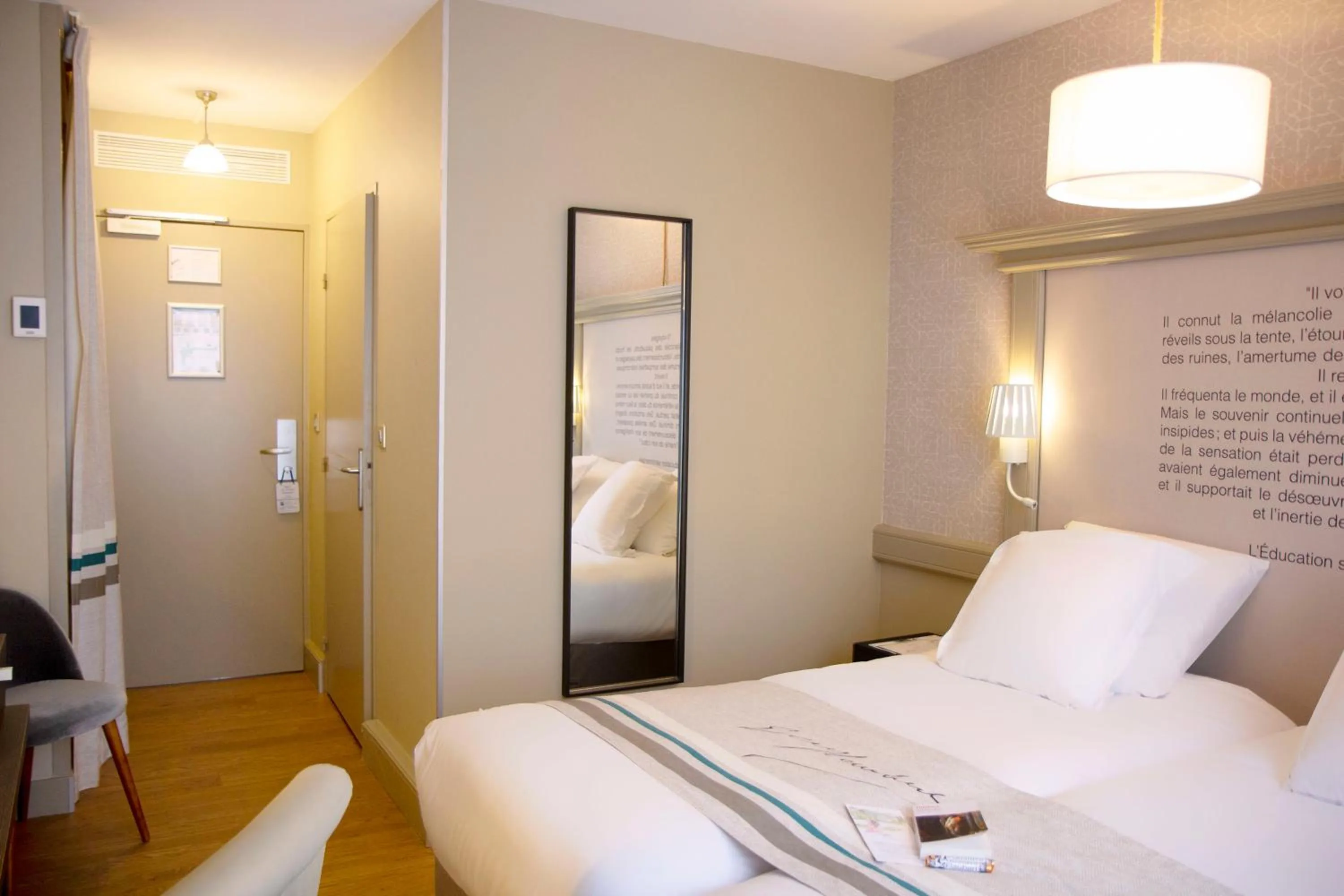 Bed in Hôtel Littéraire Gustave Flaubert, BW Signature Collection