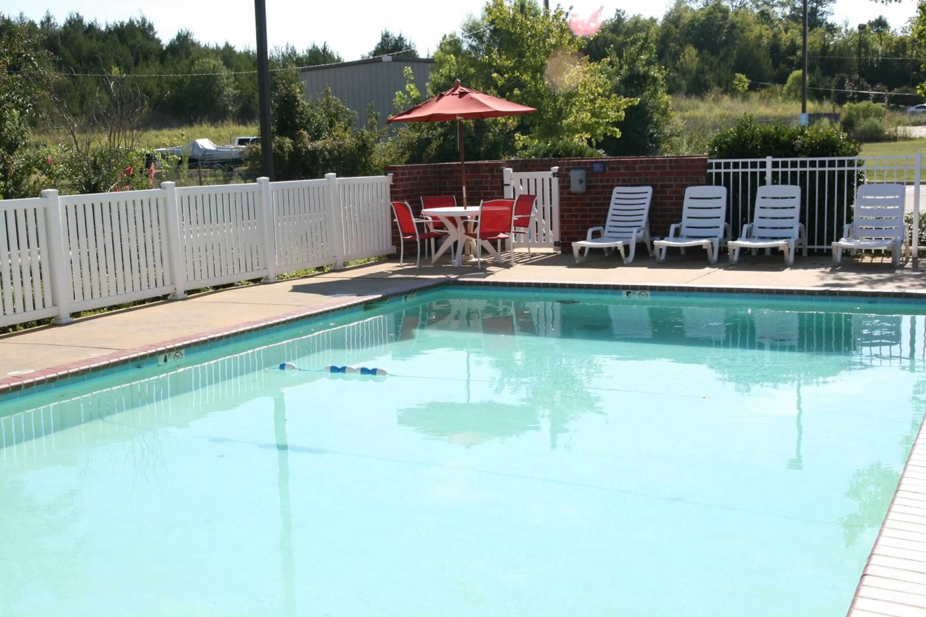 Swimming Pool in Microtel Inn & Suites by Wyndham Starkville