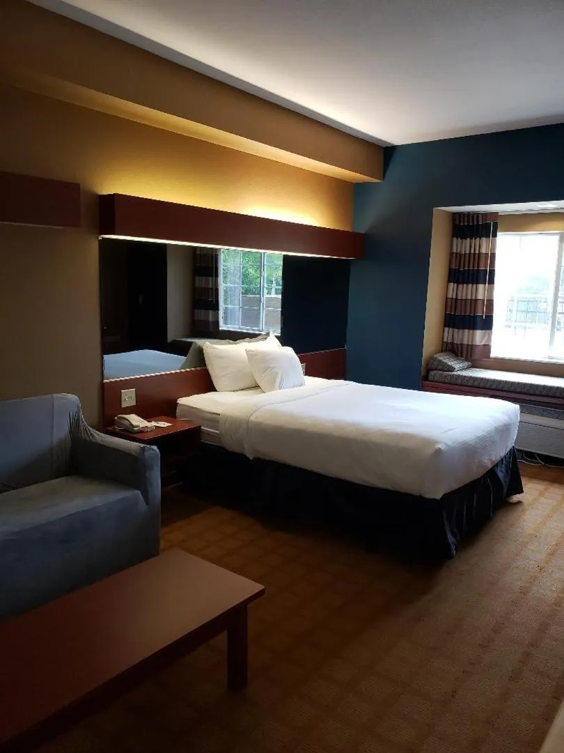 Bedroom in Microtel Inn & Suites by Wyndham Starkville