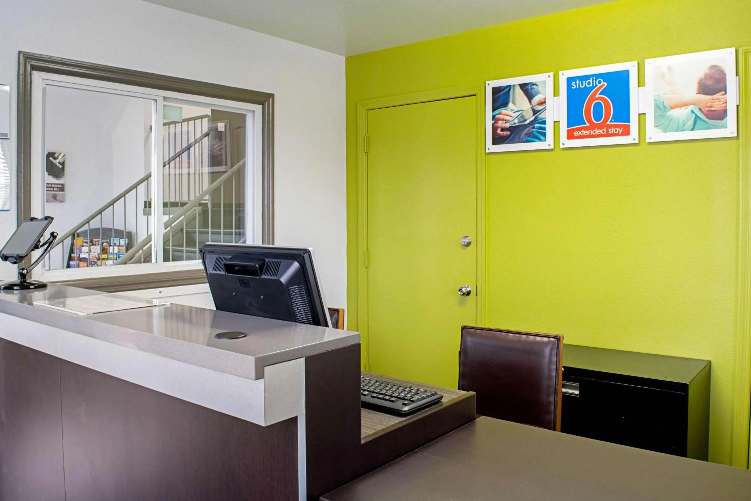 Property logo or sign in Welcome Suites Springdale