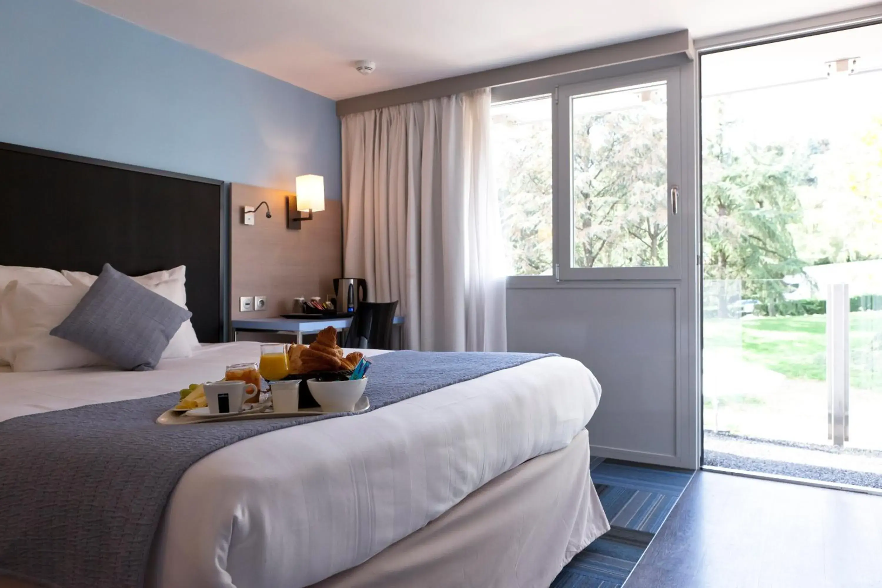 Bedroom, Bed in Kyriad Lyon Sud Sainte Foy Bedroom, Bed in Kyriad Lyon Sud Sainte Foy