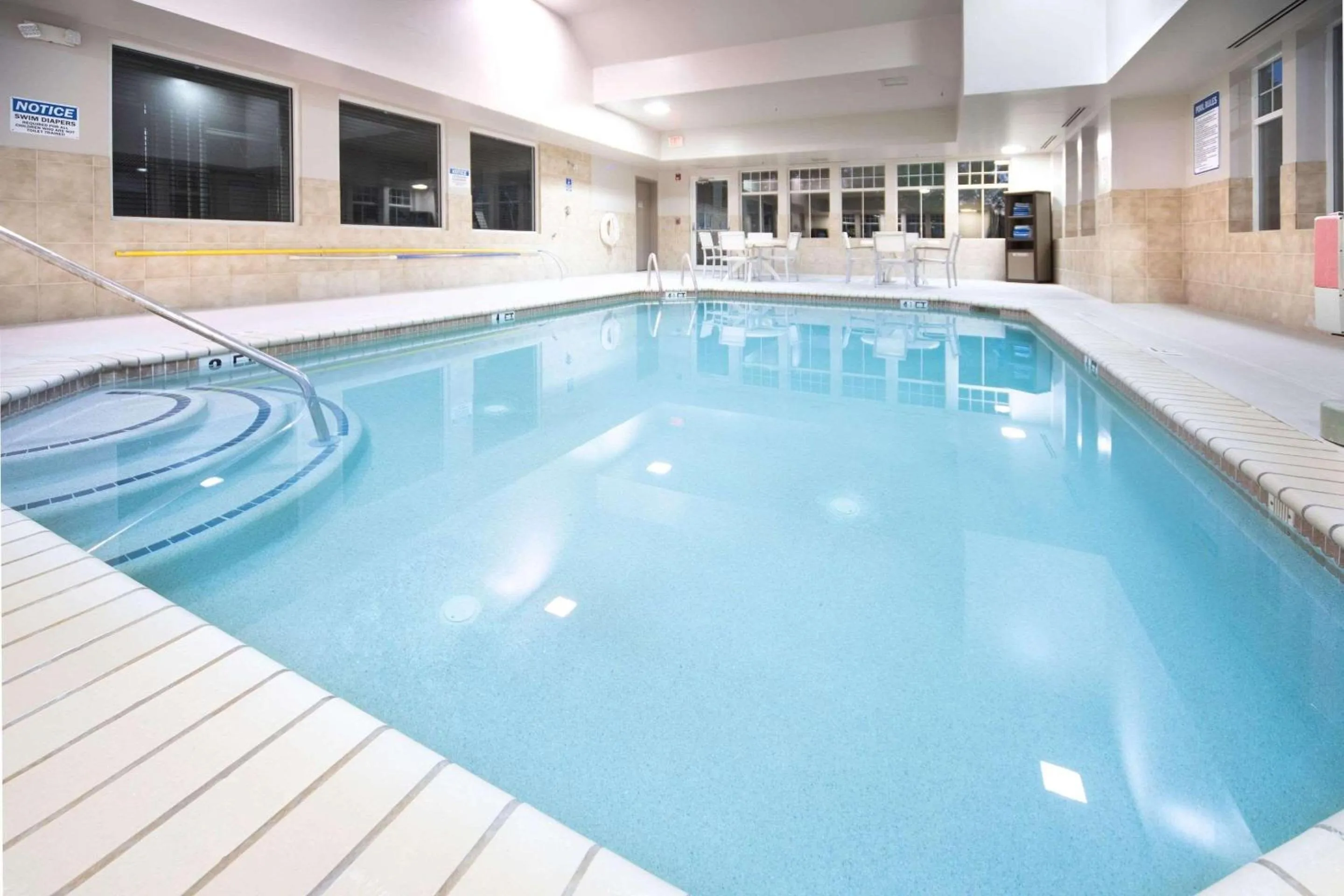 Swimming pool in Country Inn & Suites by Radisson, Stone Mountain, GA