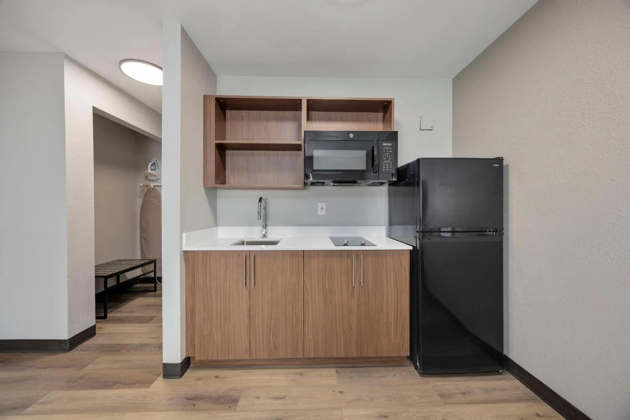 Kitchen or kitchenette in HomeStay Suites
