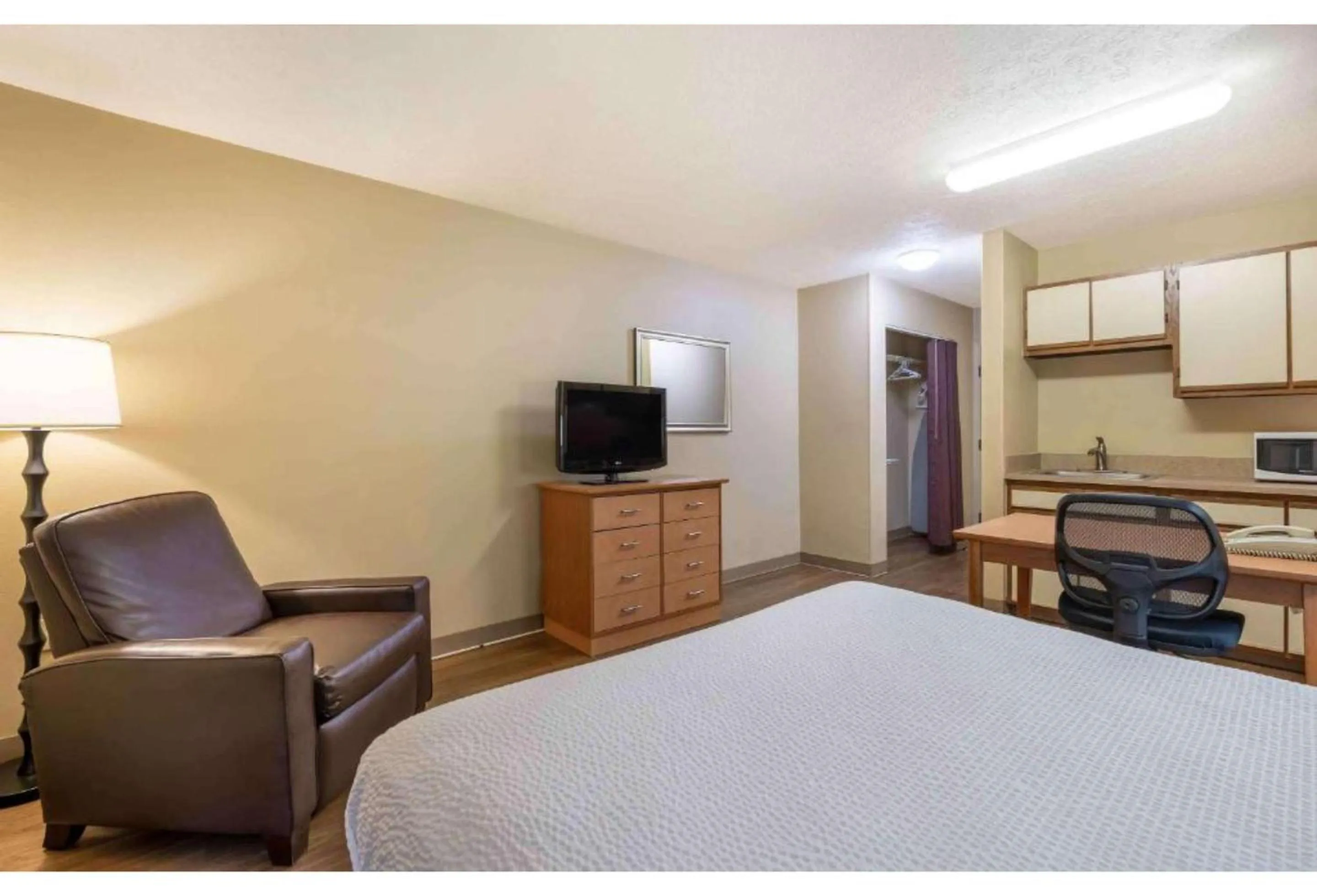 Bed in Studio 6 Suites Greenville, SC - Haywood Mall
