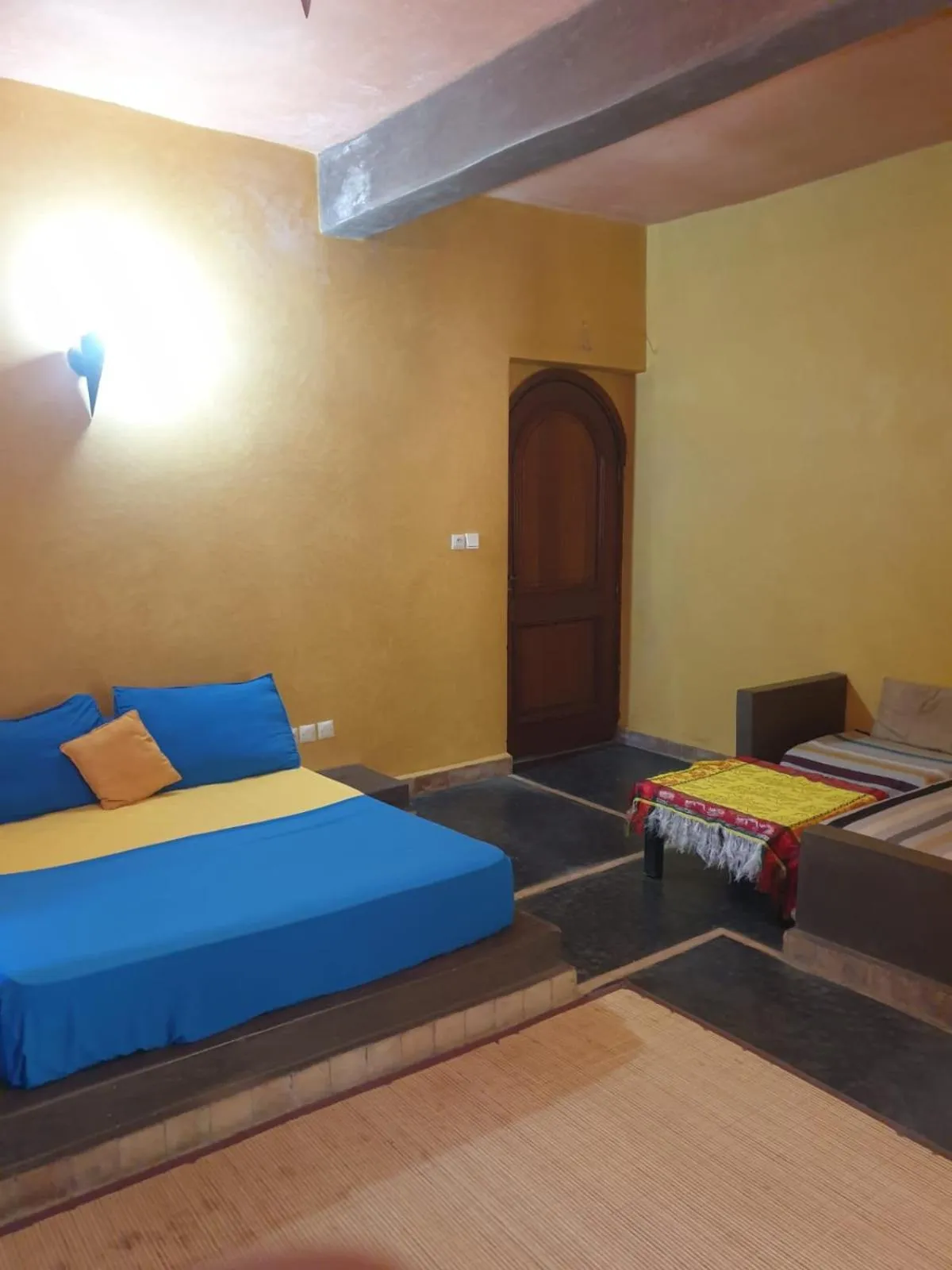 Photo of the whole room, Bed in Atlas Tigmi