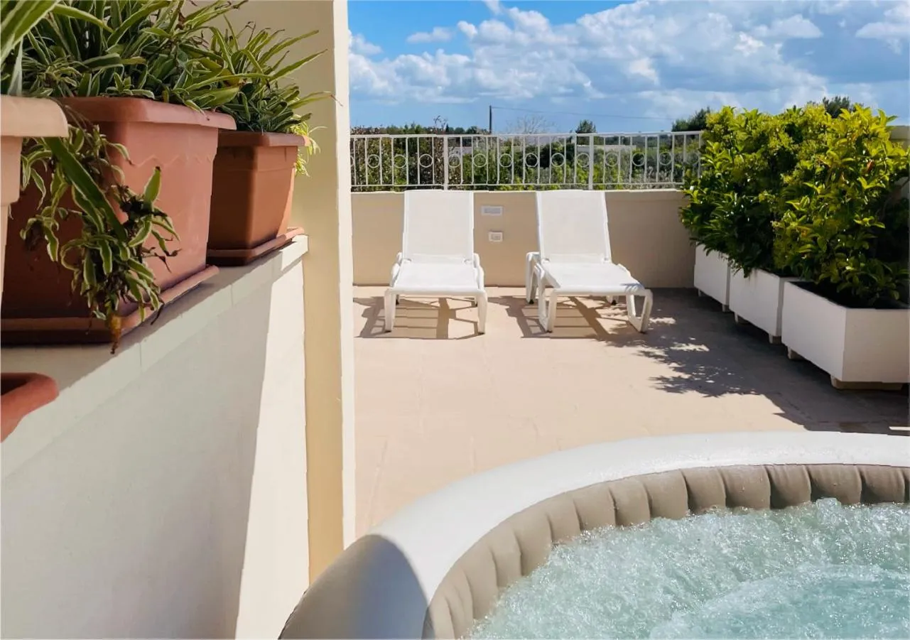 Patio in La Collina di Montegrappa - Suites with Heated Private Pool - Suites with Shared Pool