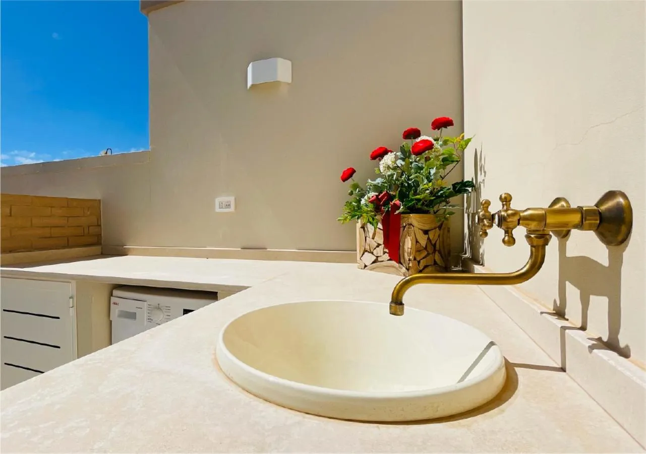 washing machine in La Collina di Montegrappa - Suites with Heated Private Pool - Suites with Shared Pool