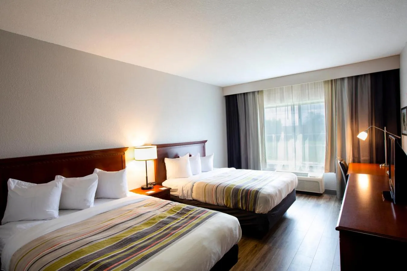 Bed in Country Inn & Suites by Radisson, Wilson, NC