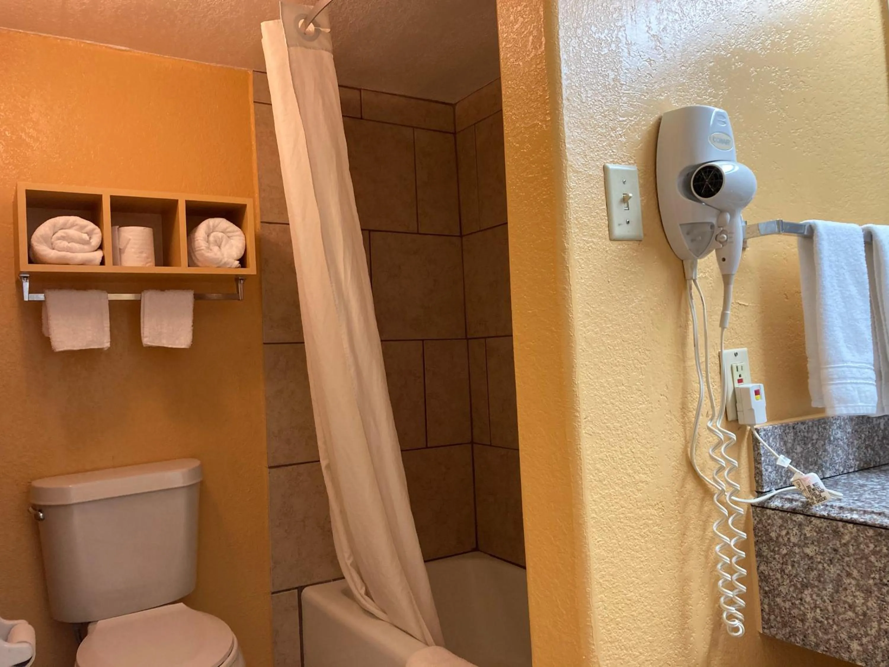 Toilet, Bathroom in Super 8 by Wyndham Little Rock/North/Airport