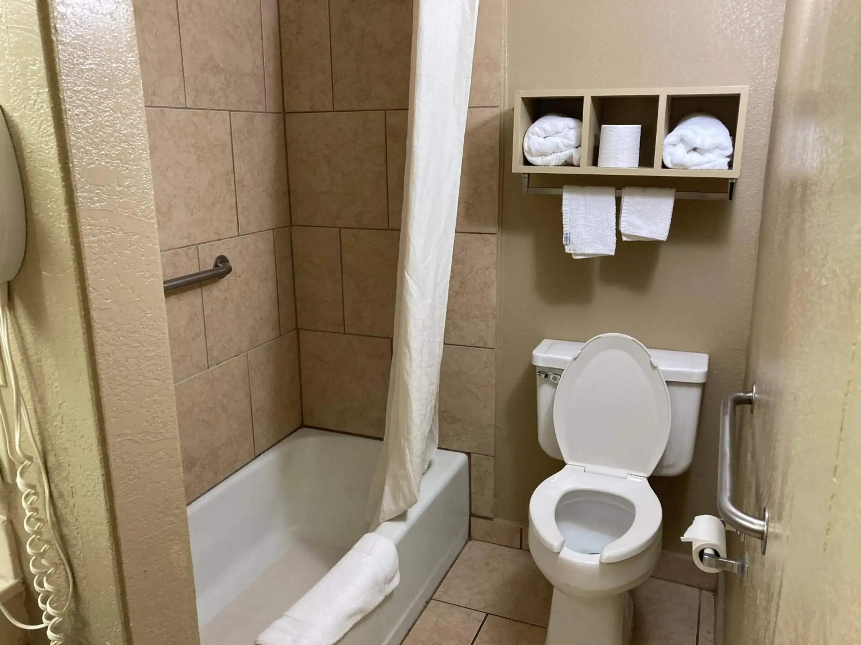 Toilet, Bathroom in Super 8 by Wyndham Little Rock/North/Airport
