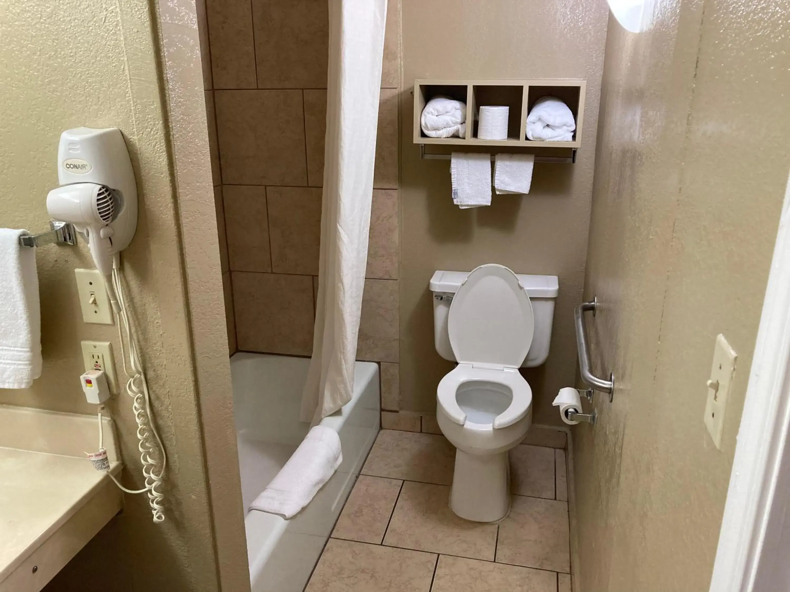 Toilet, Bathroom in Super 8 by Wyndham Little Rock/North/Airport