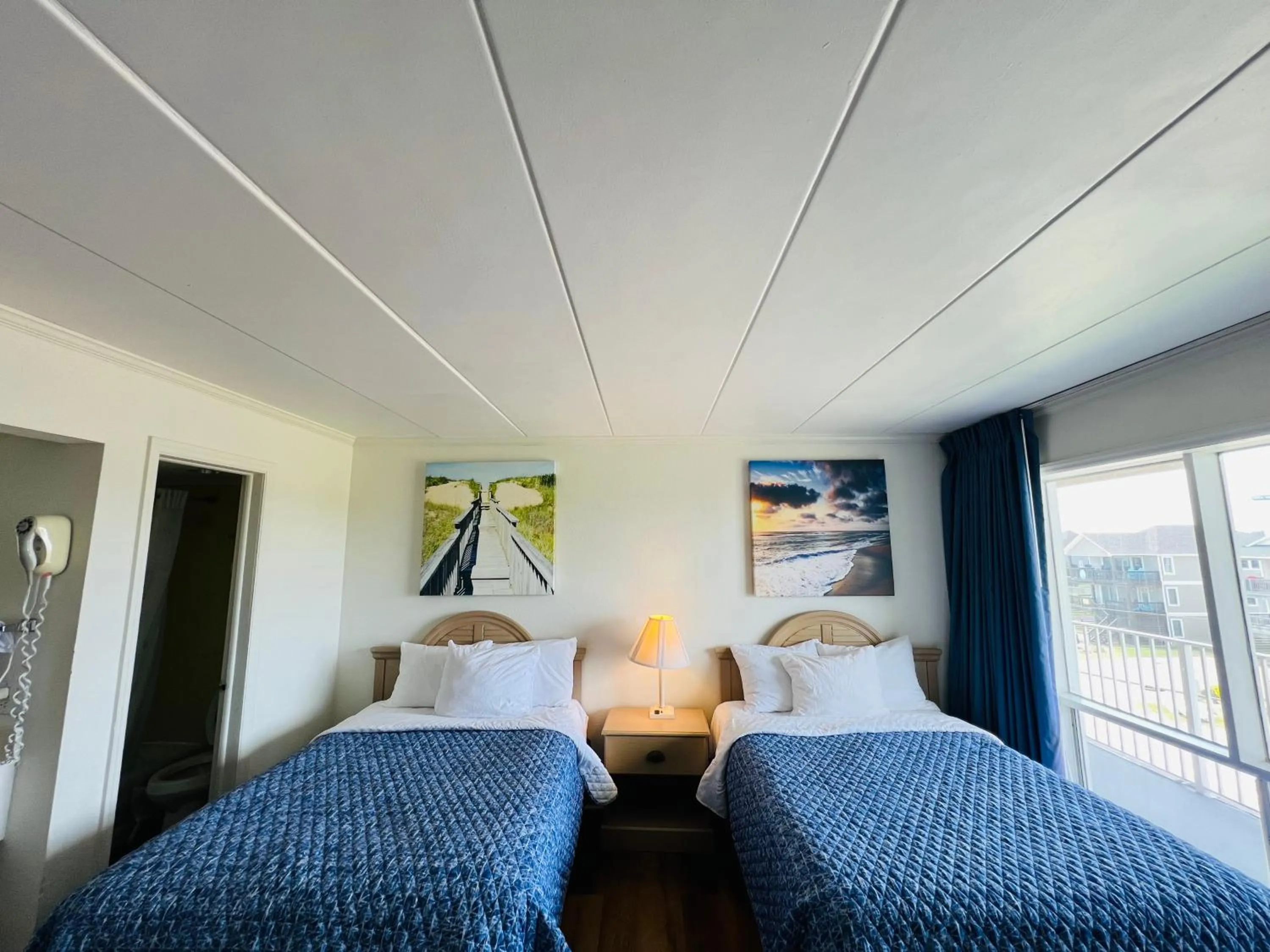 Bed in Mariner Inn And Suites