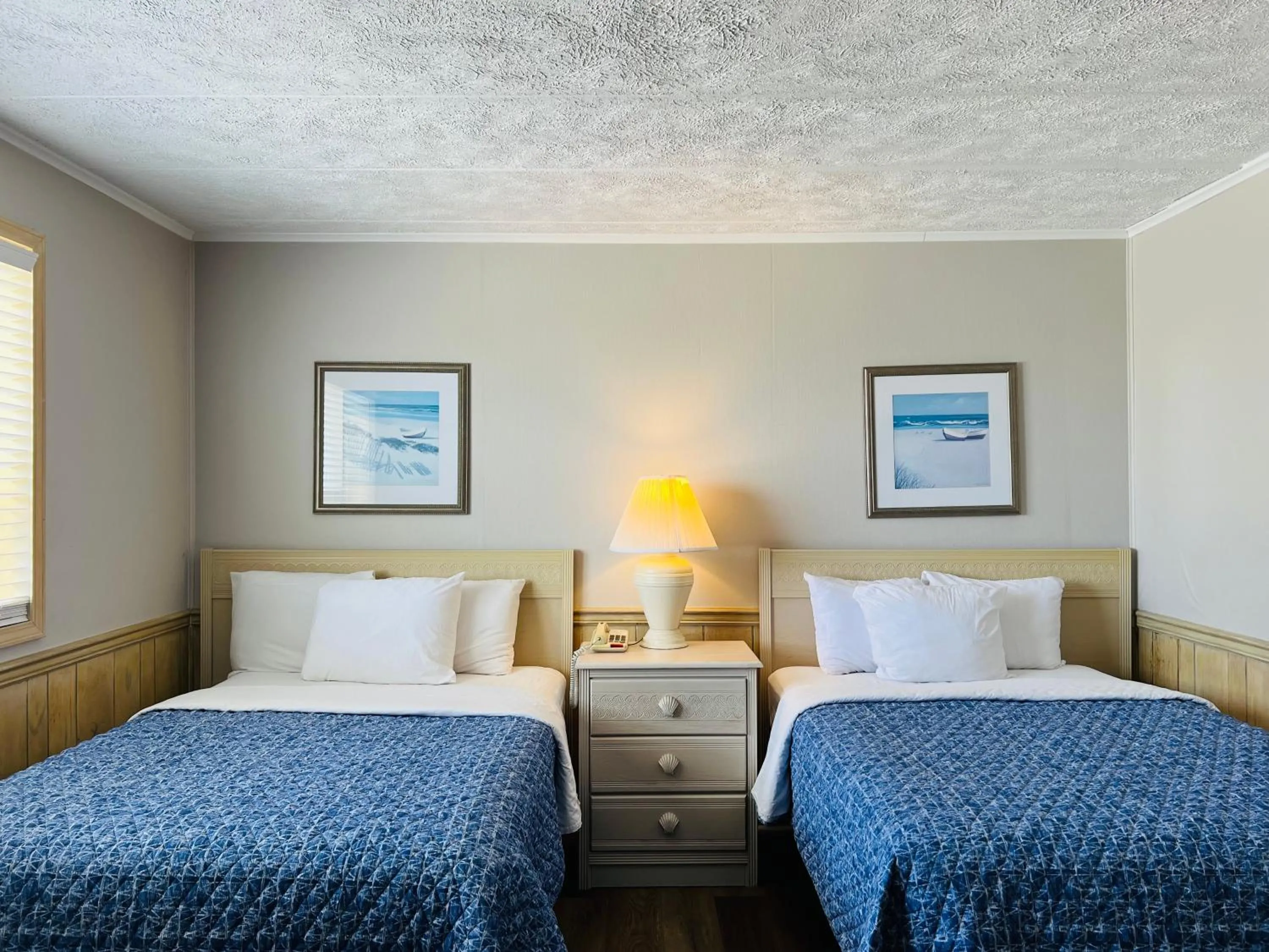 Bed in Mariner Inn And Suites