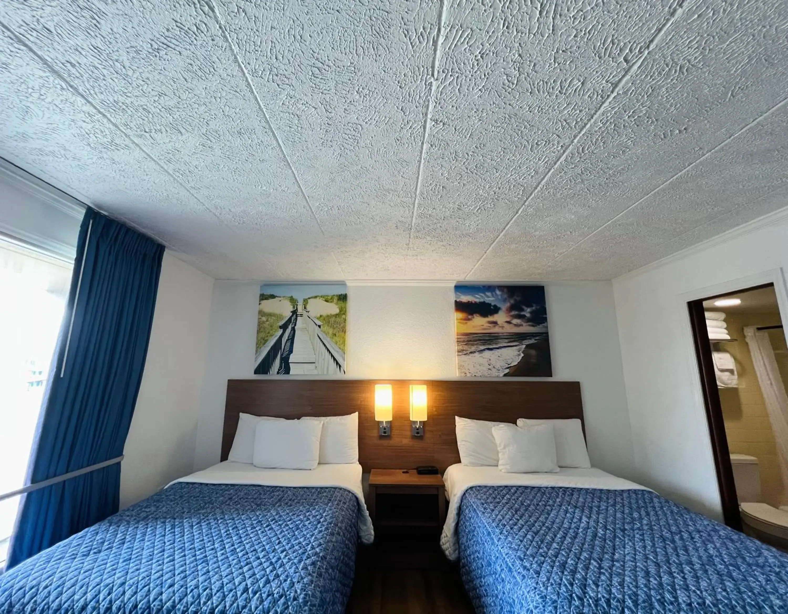 Bed in Mariner Inn And Suites Bed in Mariner Inn And Suites