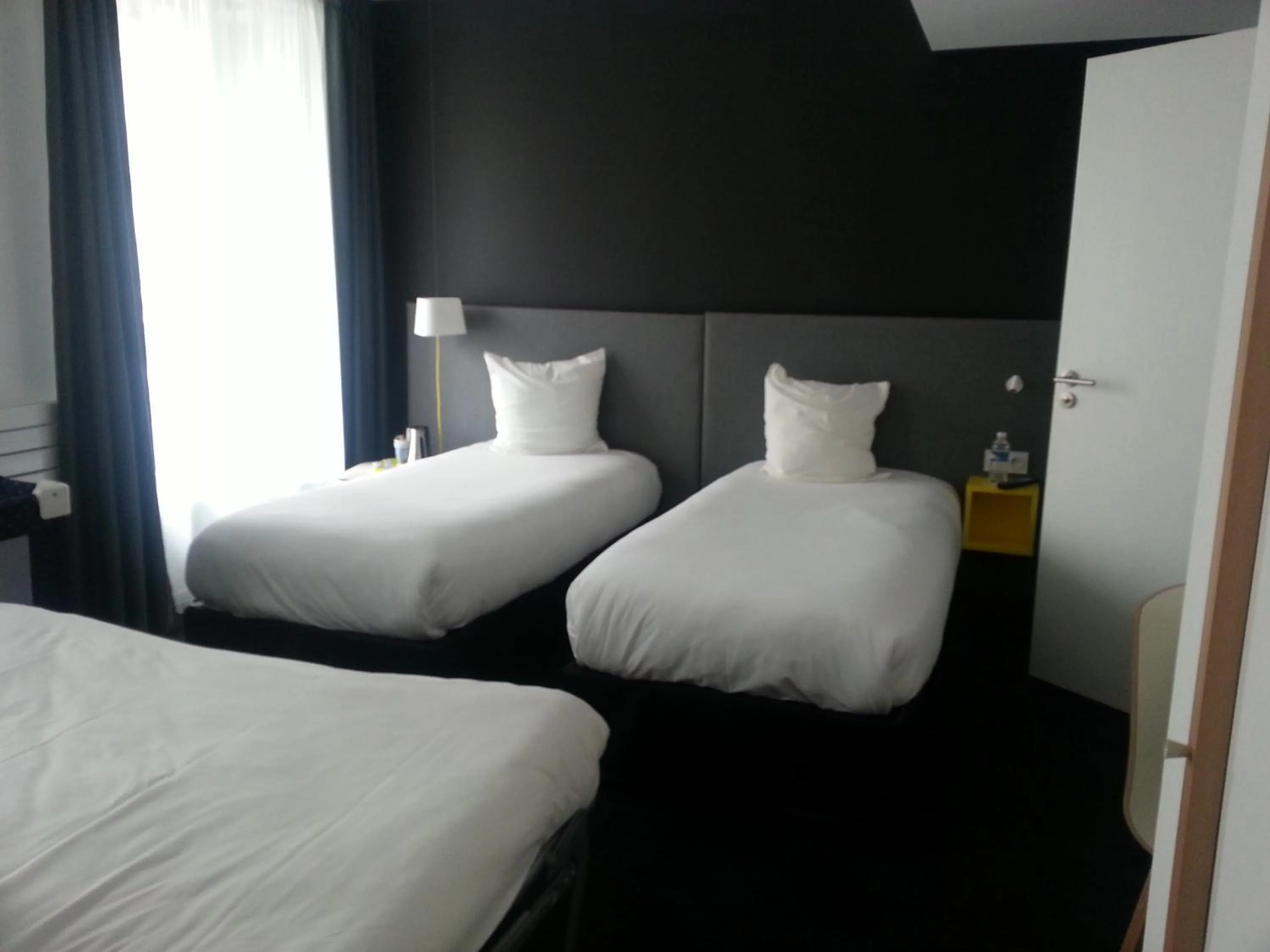 Bed in Kyriad Hotel Brest
