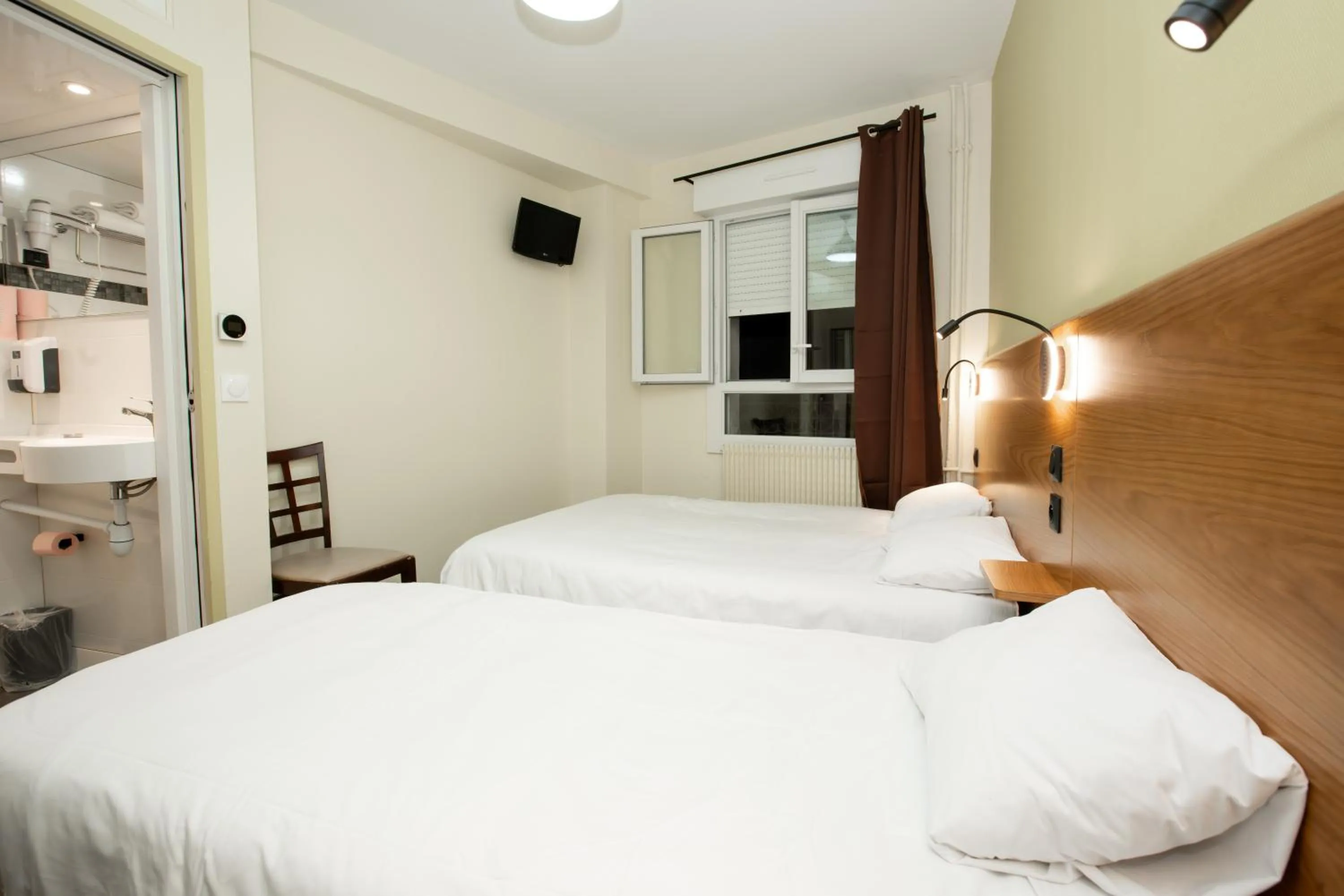 Bed in Hôtel de la Terrasse