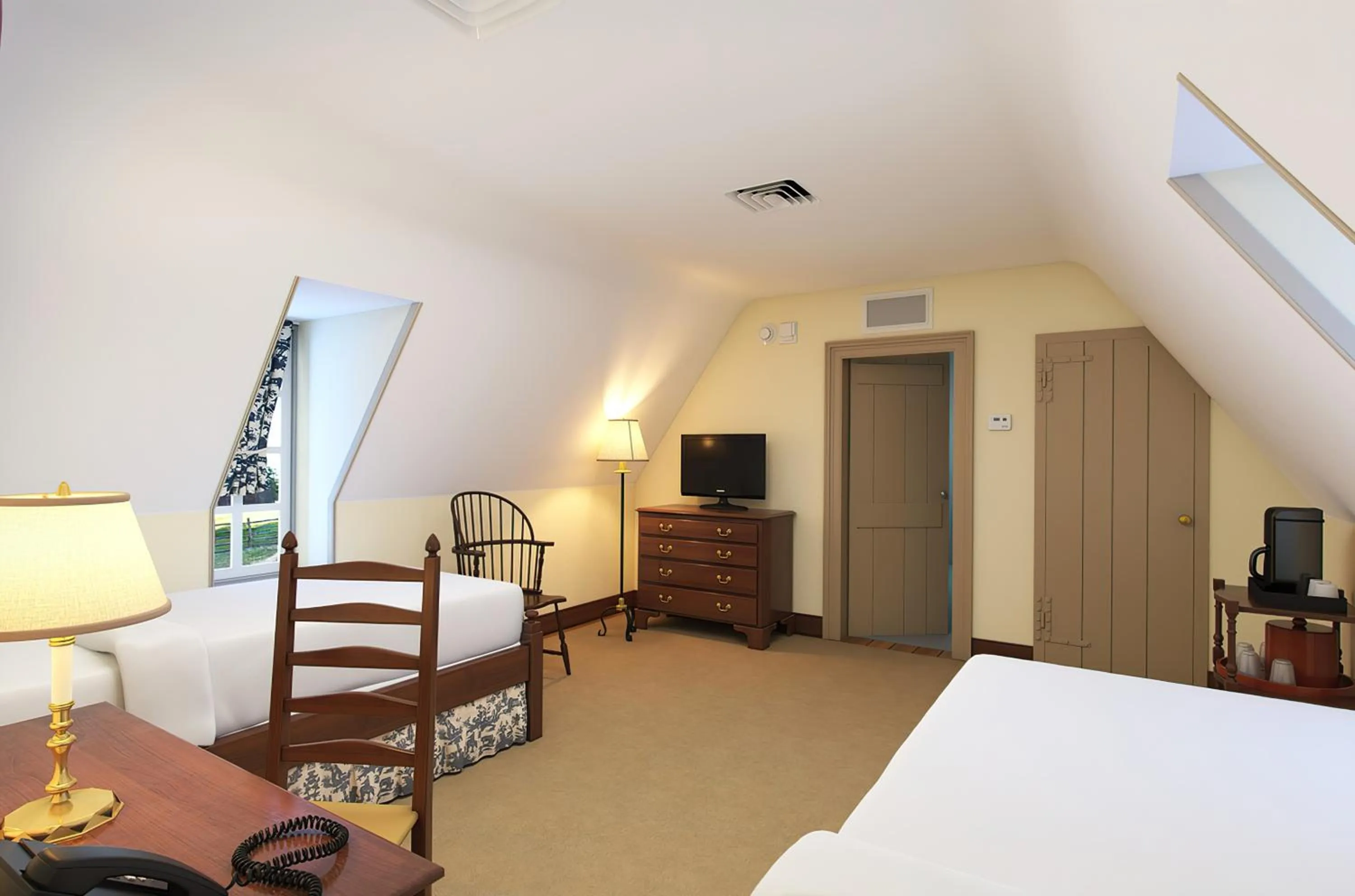 Bed in Colonial Houses, an official Colonial Williamsburg Hotel