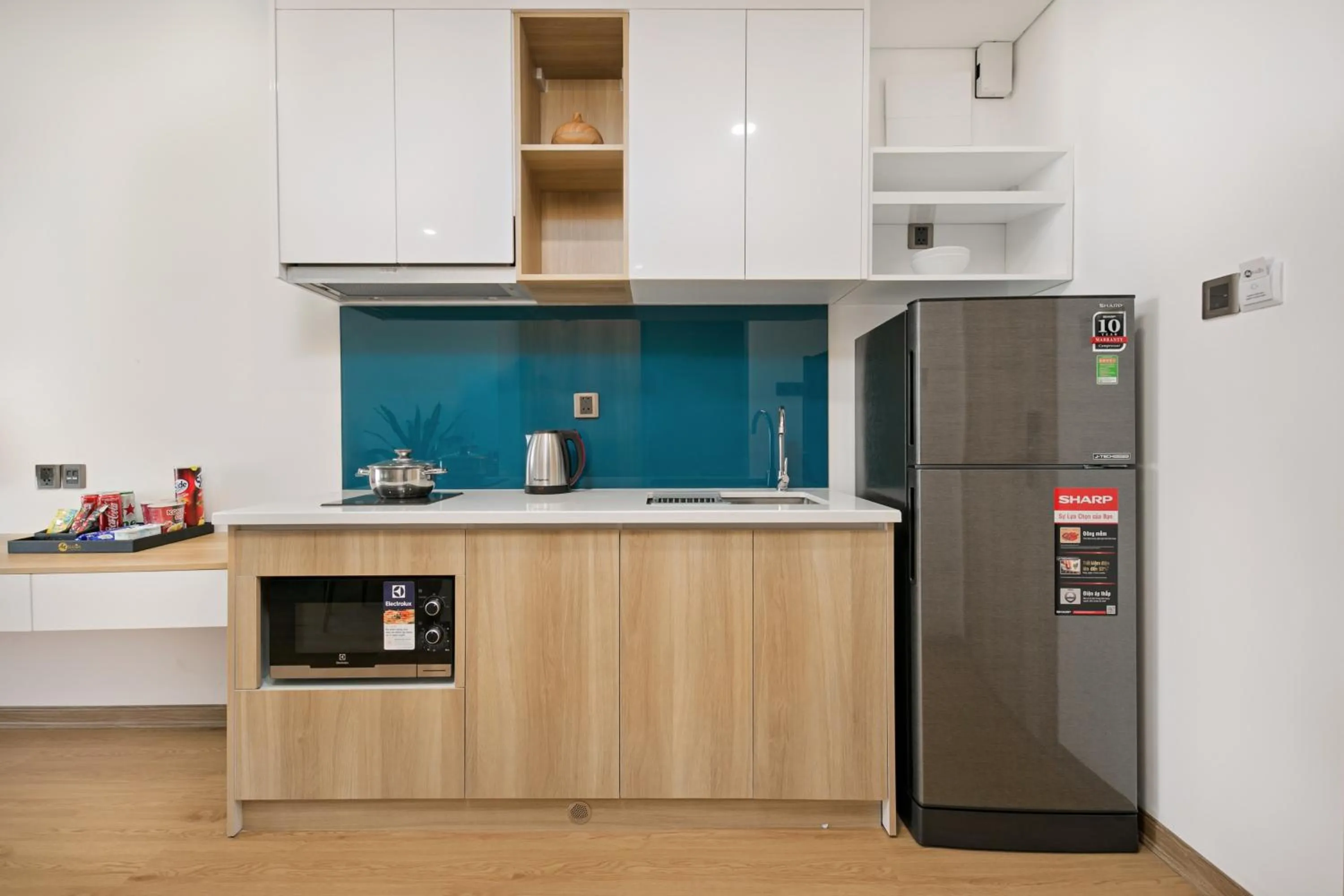 Kitchen or kitchenette in Meliora Hotel & Apartment