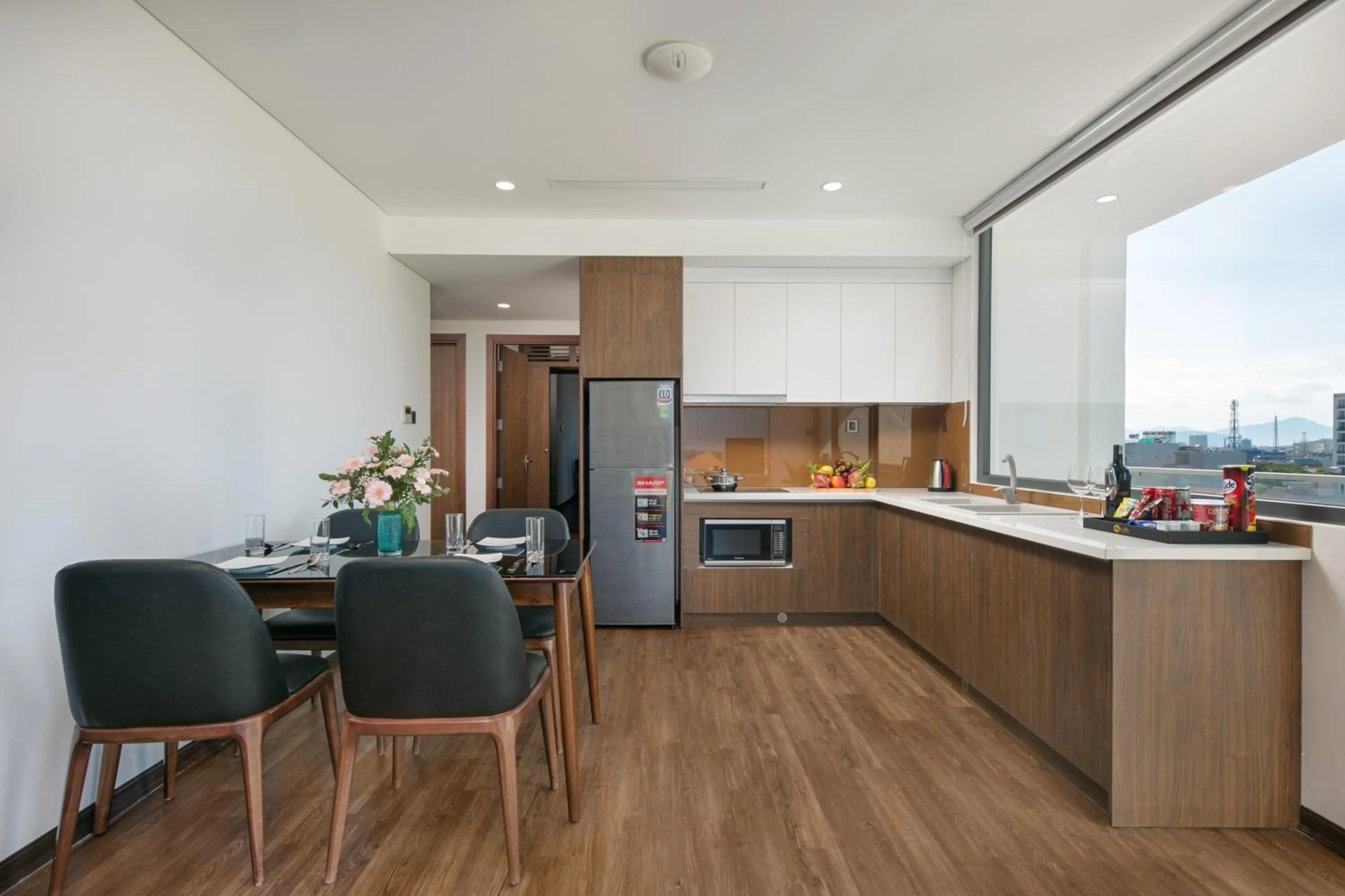 Kitchen or kitchenette in Meliora Hotel & Apartment