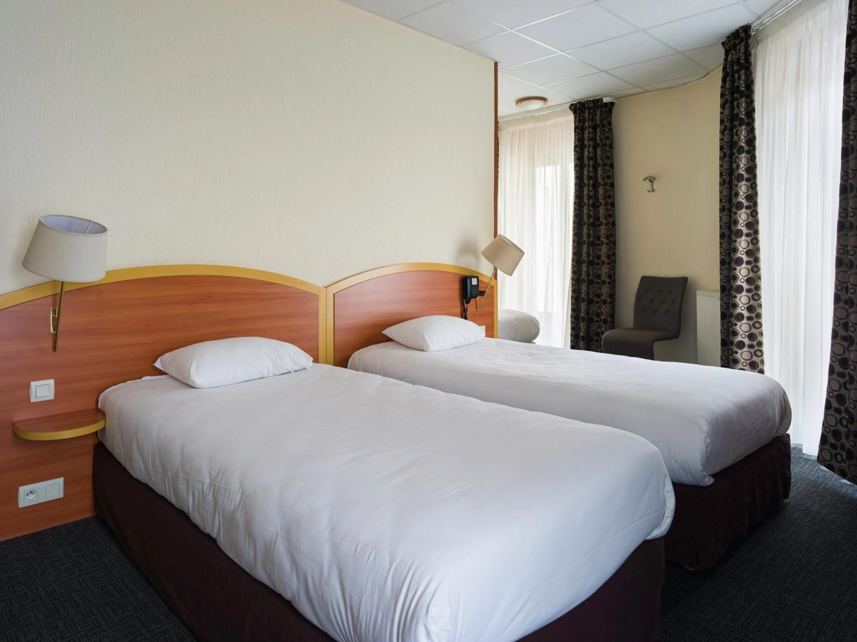 Photo of the whole room, Bed in Kyriad Hôtel Lamballe - Gare TGV - Centre ville