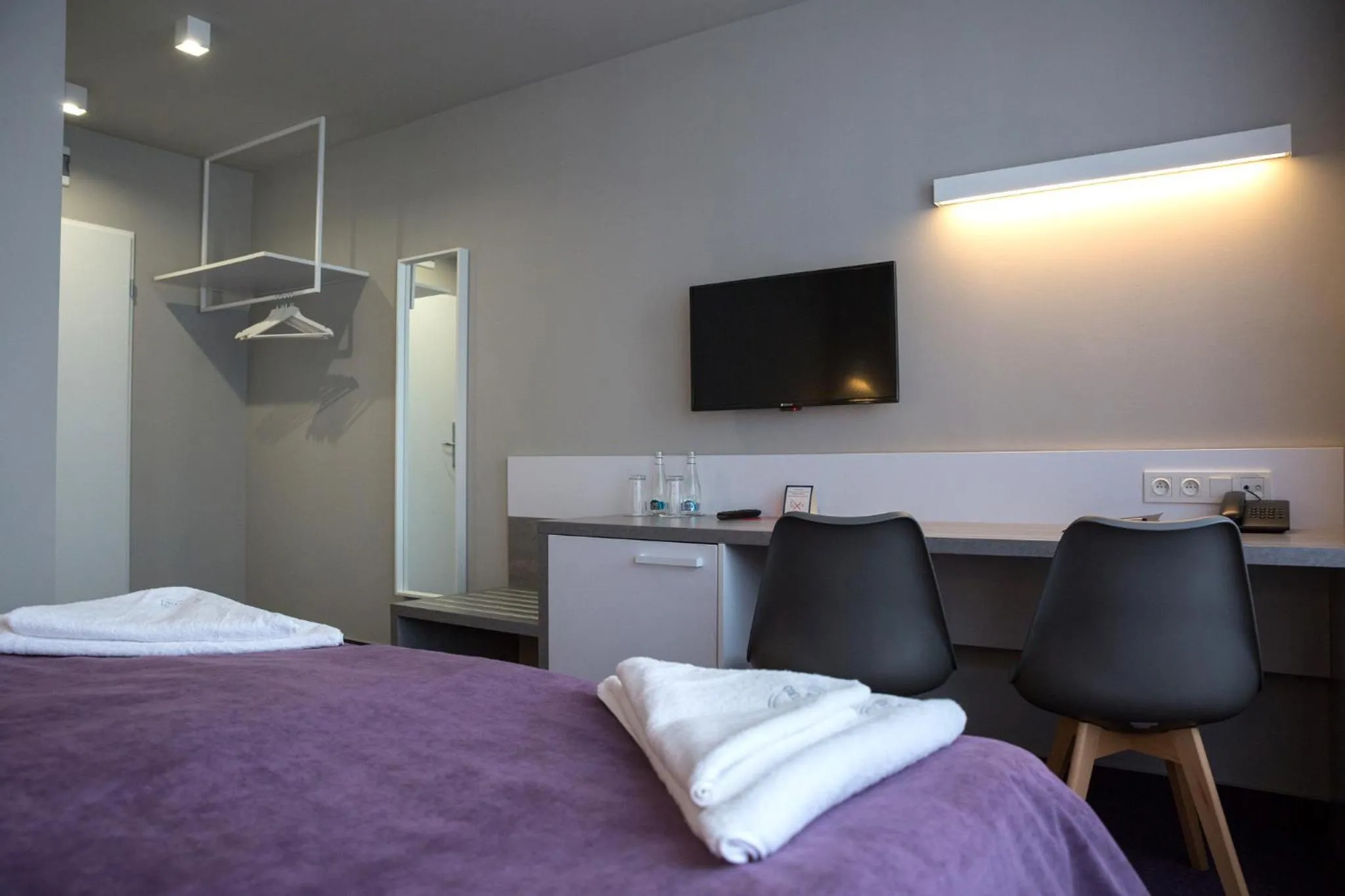 Bed in Hotel Quattro