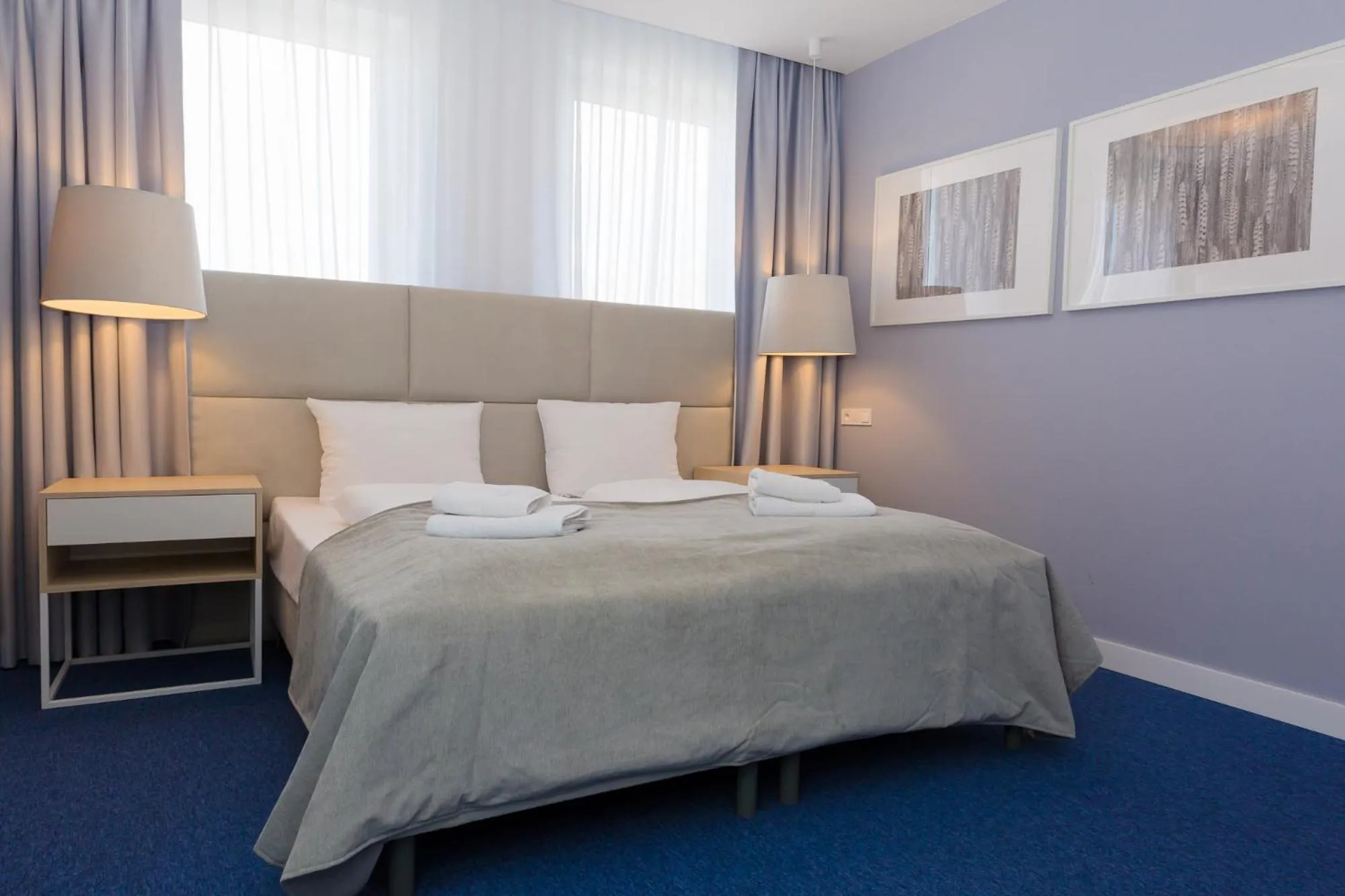 Bed in Hotel Quattro